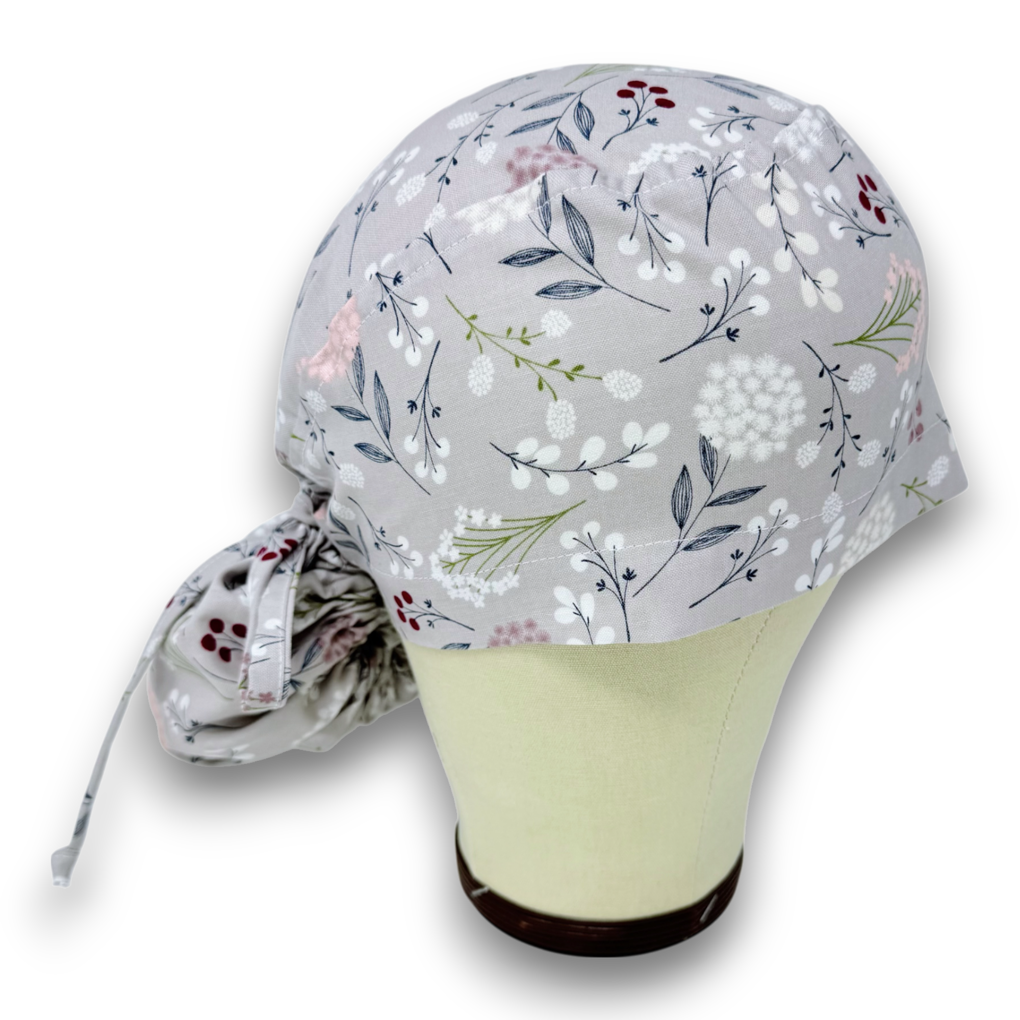 Flower Ponytail scrub cap for women with satin lined option by Paradise Caps.