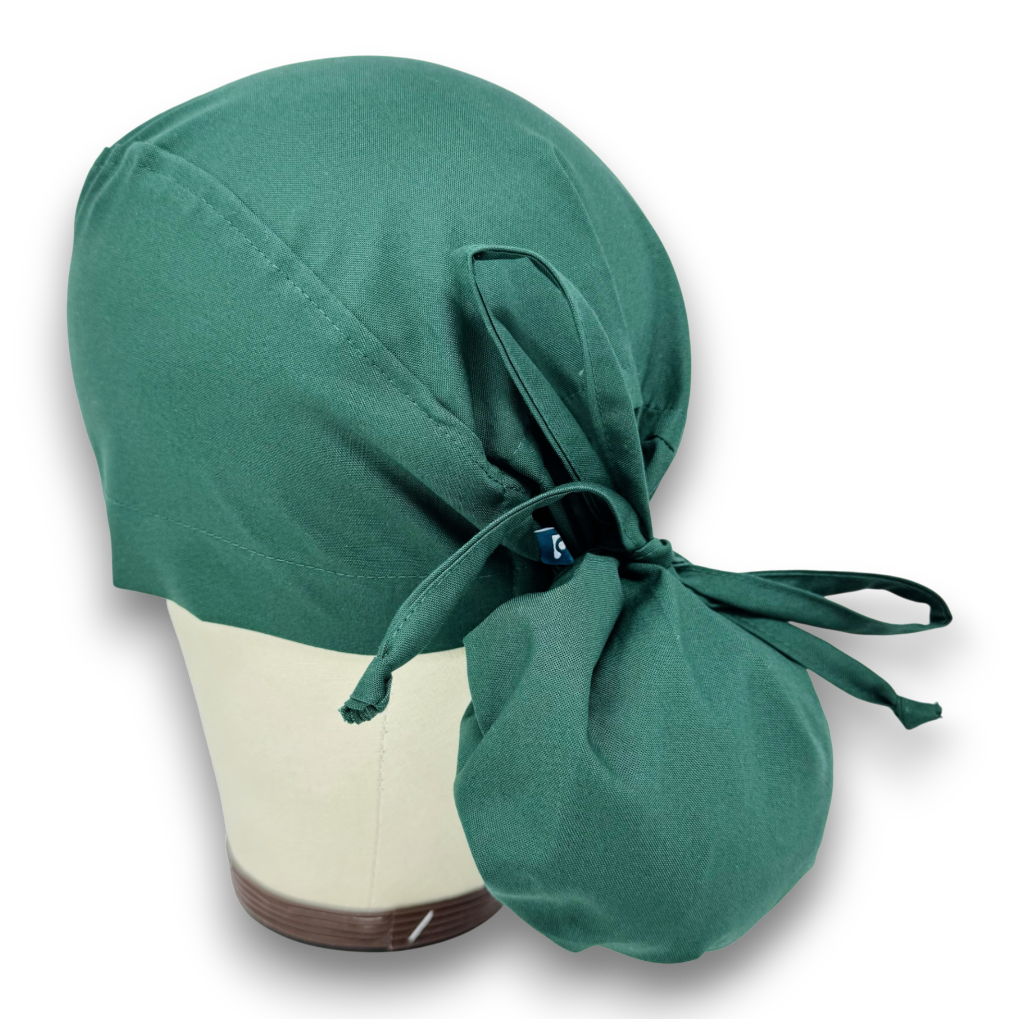 Forest green Ponytail scrub cap for women with satin lined option by Paradise Caps.