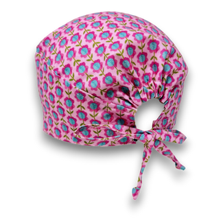 Floral Skull tie-back style surgical scrub cap with satin lined by Paradise Caps. Pink.
