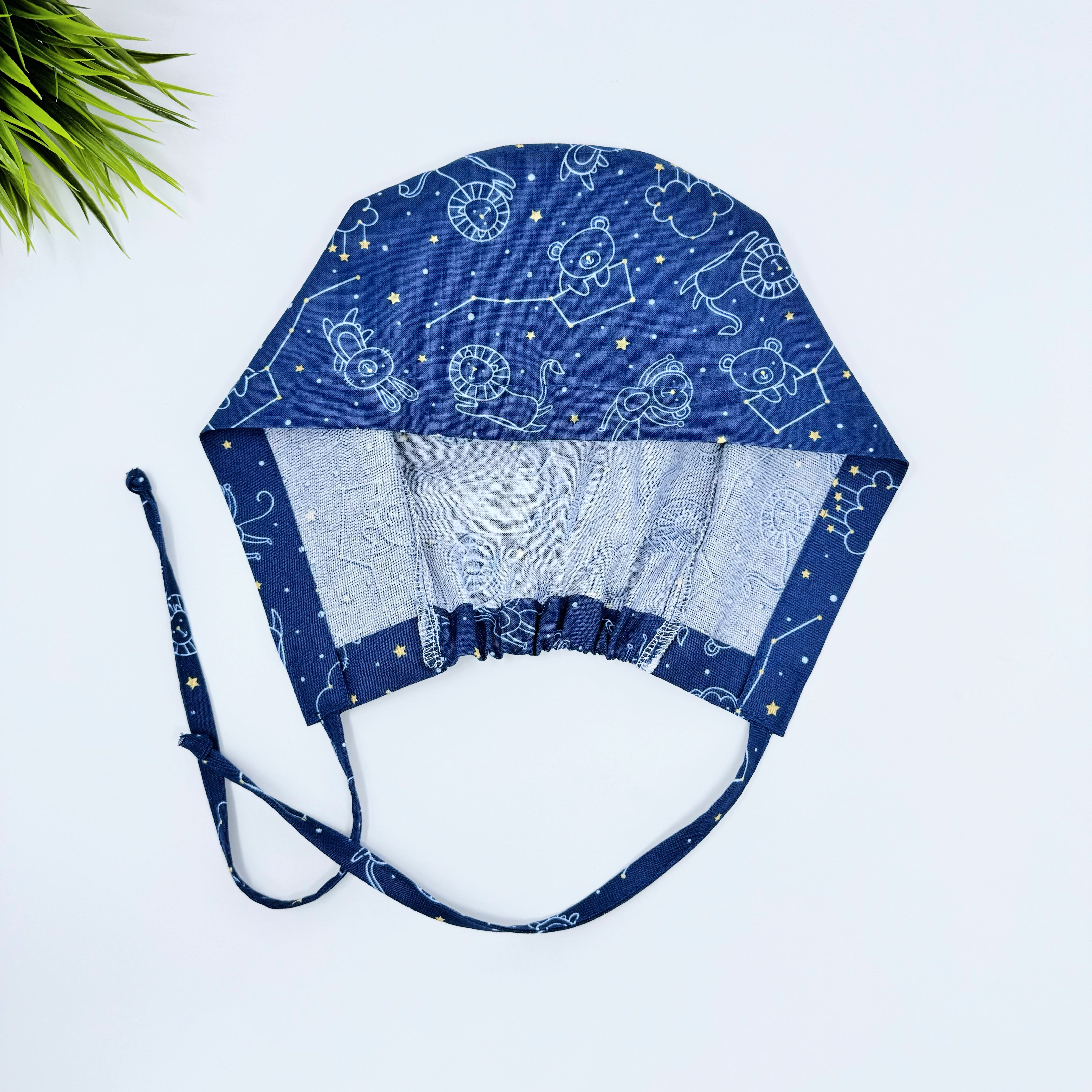 Navy Constellations Skull tie-back style surgical scrub cap for men by Paradise Caps.