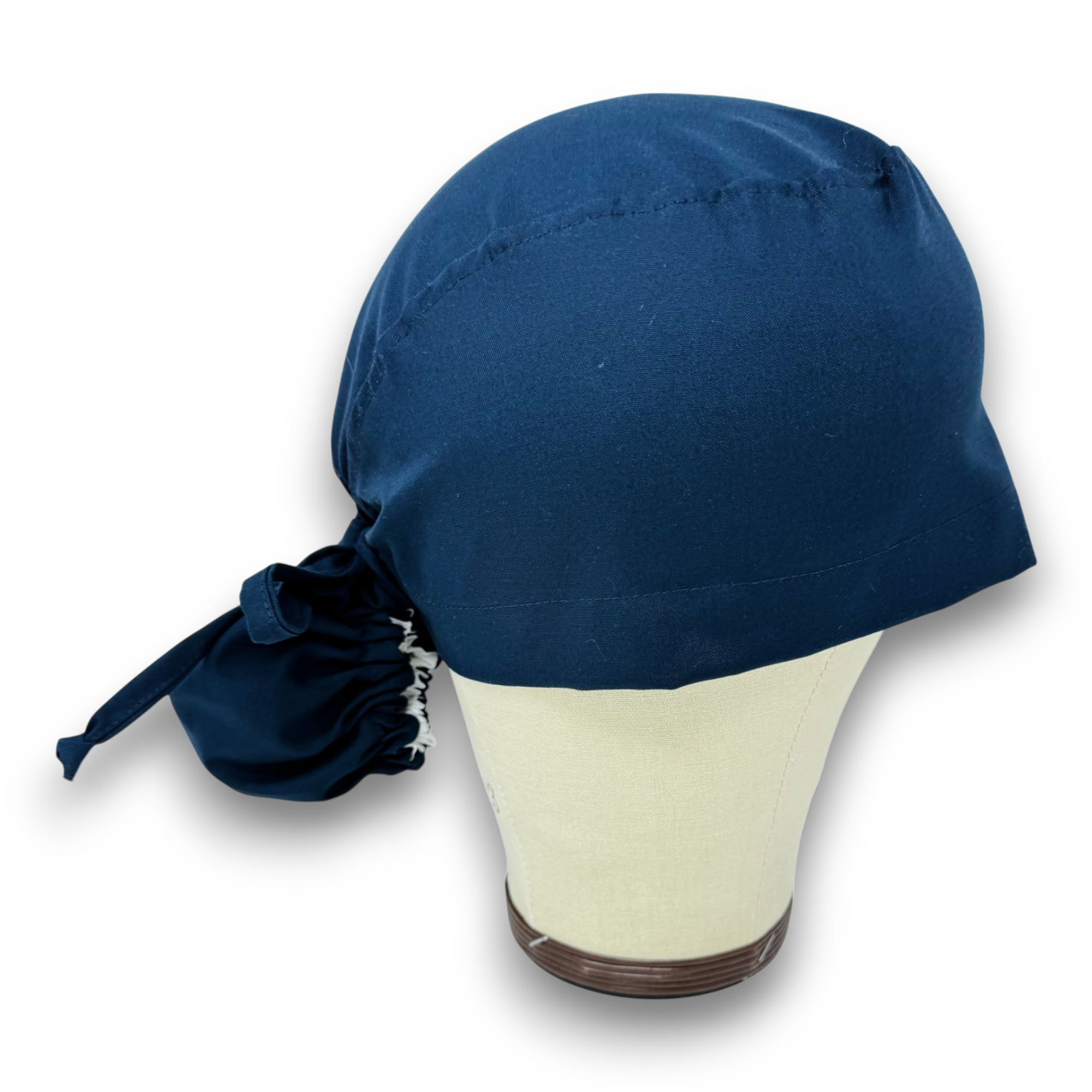 Navy blue Ponytail scrub cap for women with satin lined option by Paradise Caps.