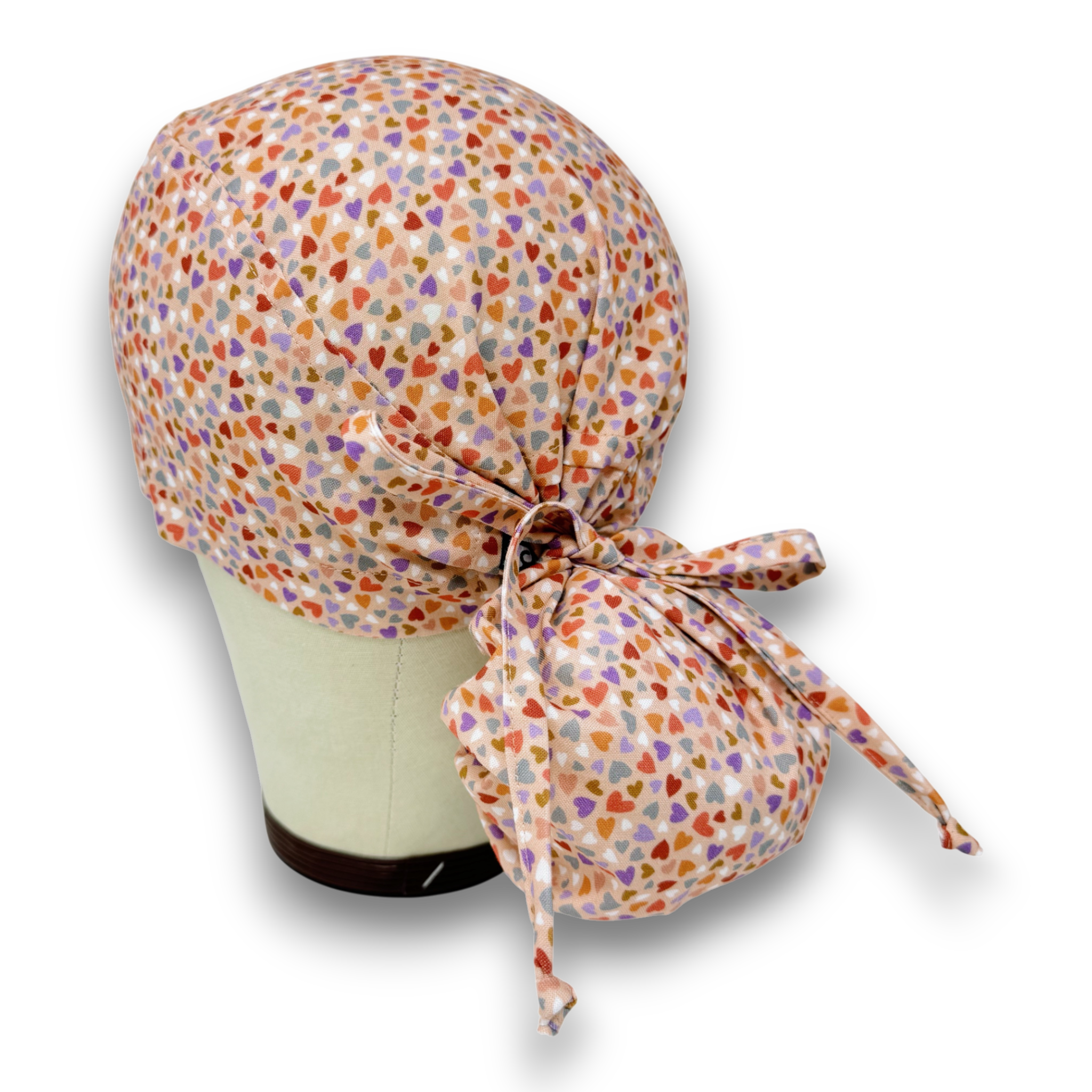 Colorful Hearts Ponytail scrub cap for women with satin lined option by Paradise Caps.