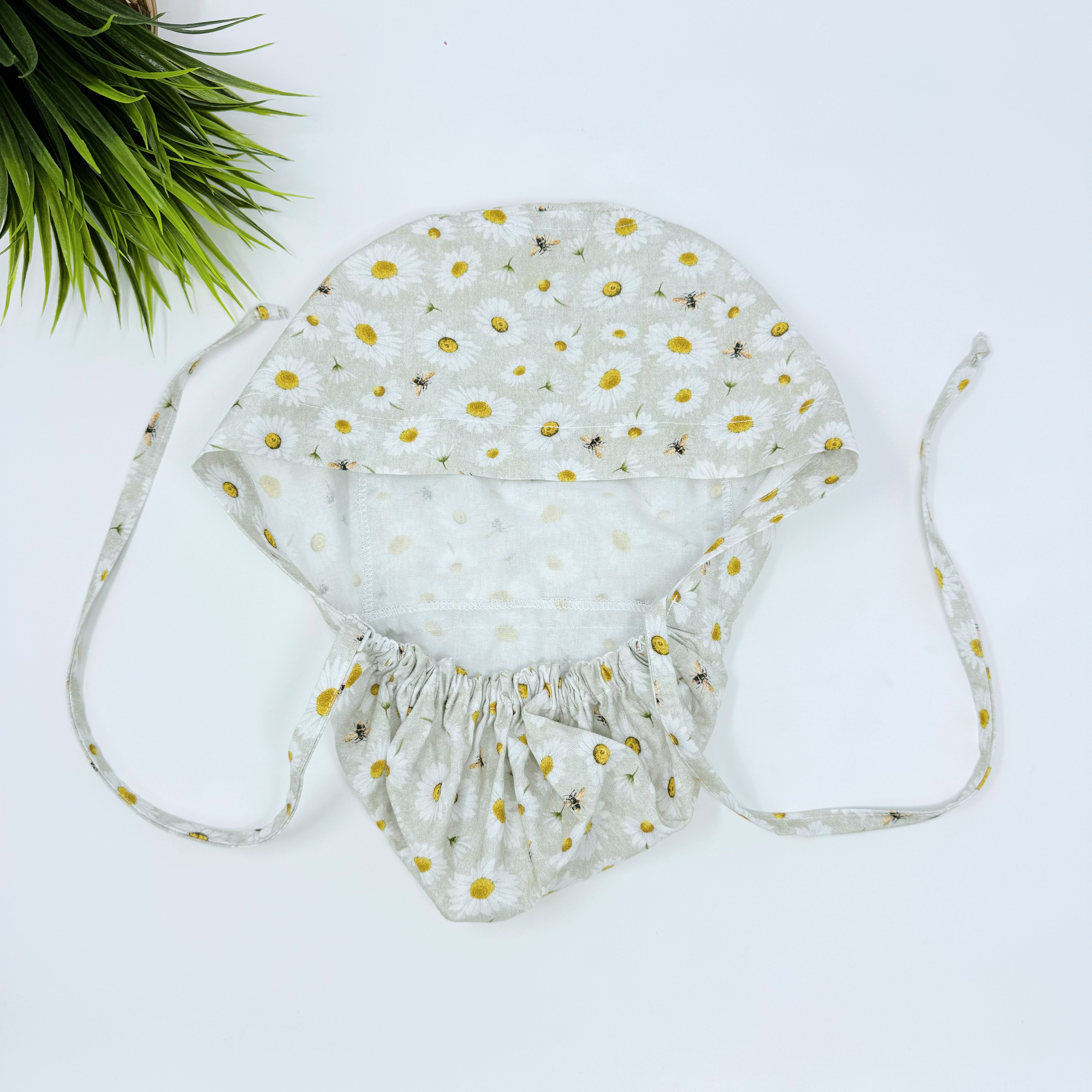 Bee And Daisy Ponytail scrub cap for women with satin lined option by Paradise Caps.