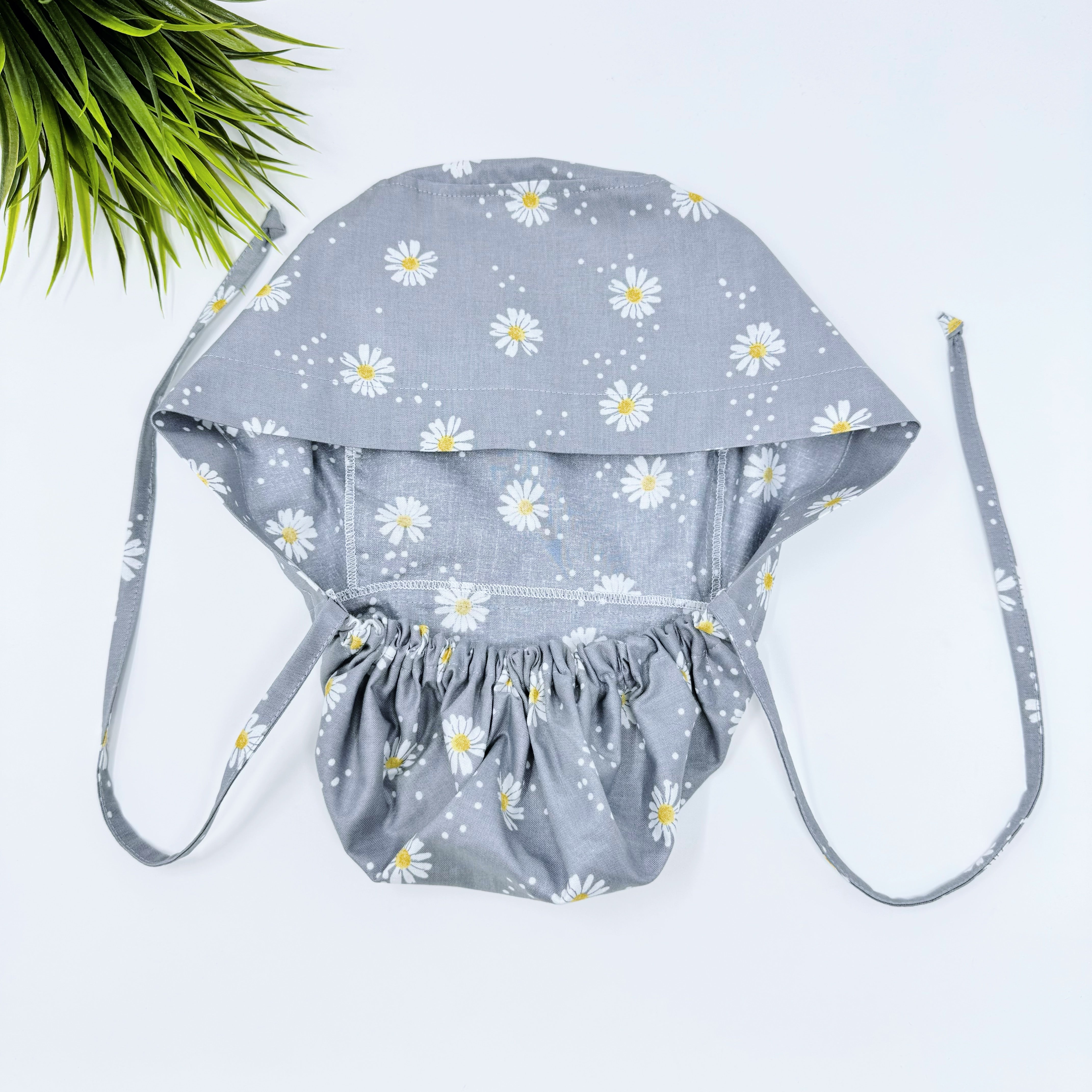 Gray Daisy Dots Ponytail scrub cap for women with satin lined option by Paradise Caps.