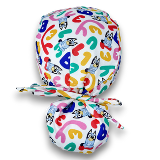 Funny Ponytail scrub cap for women with satin lined option by Paradise Caps.