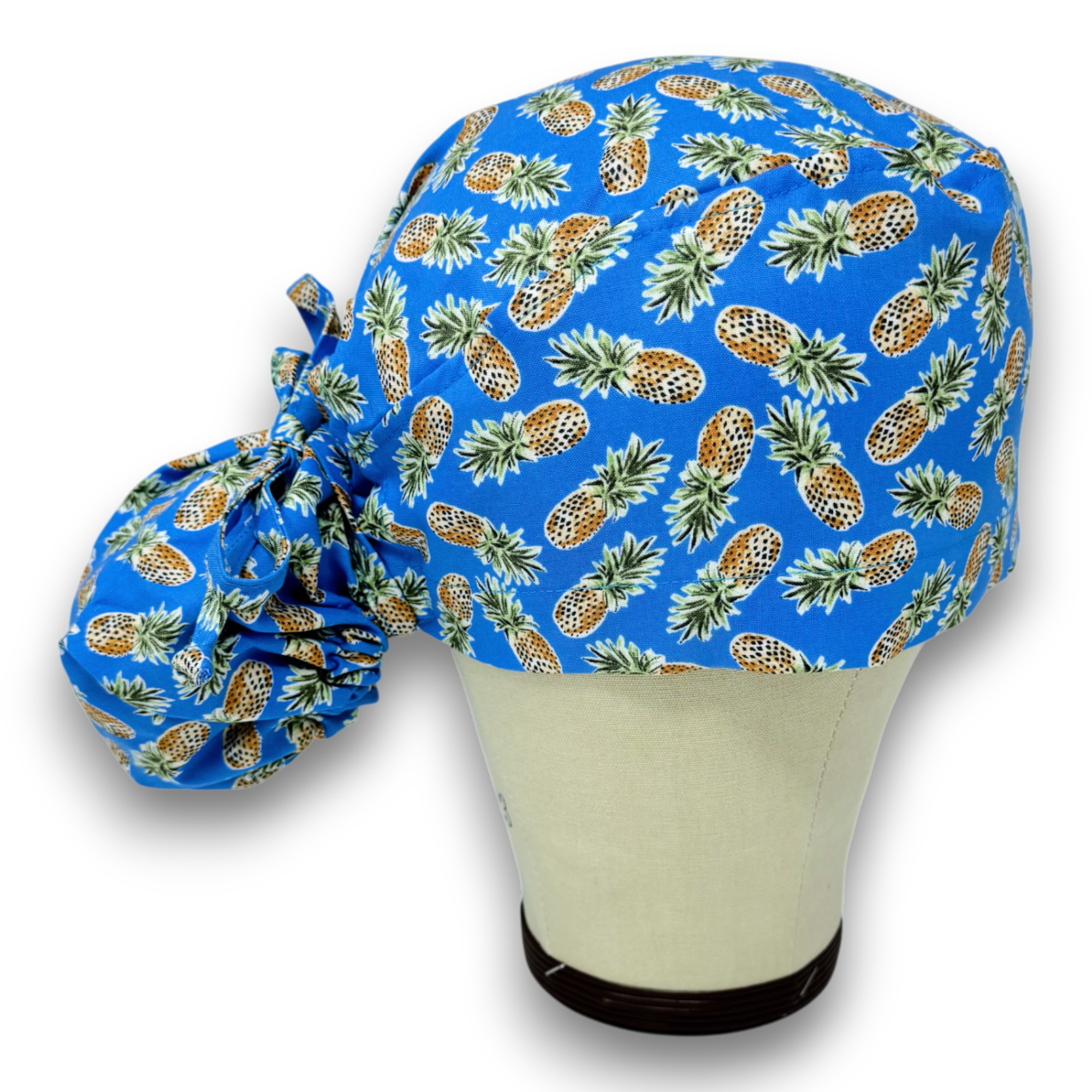 Pineapple Ponytail scrub cap for women with satin lined option by Paradise Caps.