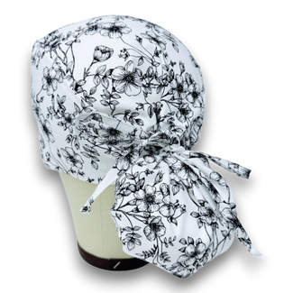 Floral Ponytail scrub cap for women with satin lined option by Paradise Caps.