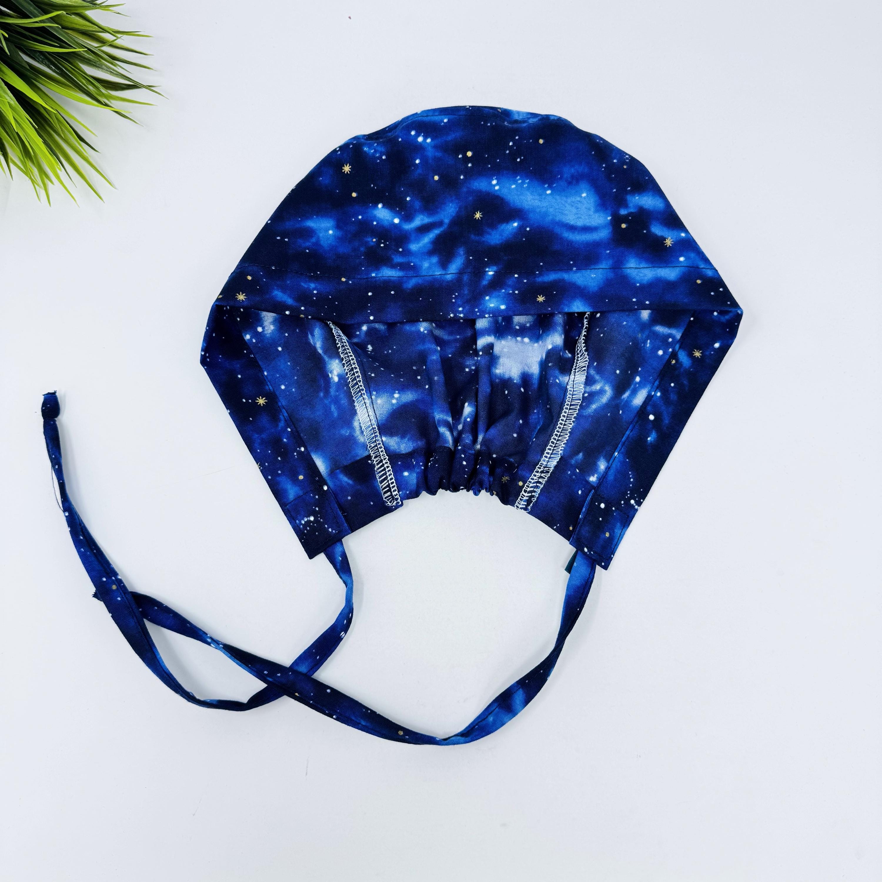 Night sky Men's Skull tie-back style surgical scrub cap for men by Paradise Caps.