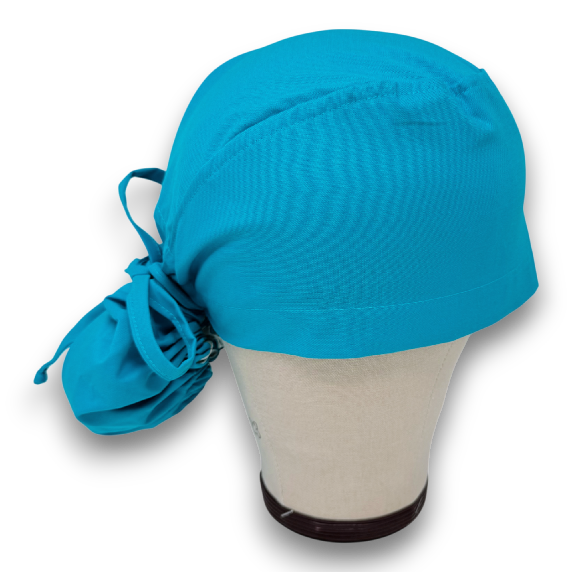 Solid blue Ponytail scrub cap for women with satin lined option by Paradise Caps.
