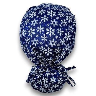 Snowflakes Ponytail scrub cap for women with satin lined option by Paradise Caps.