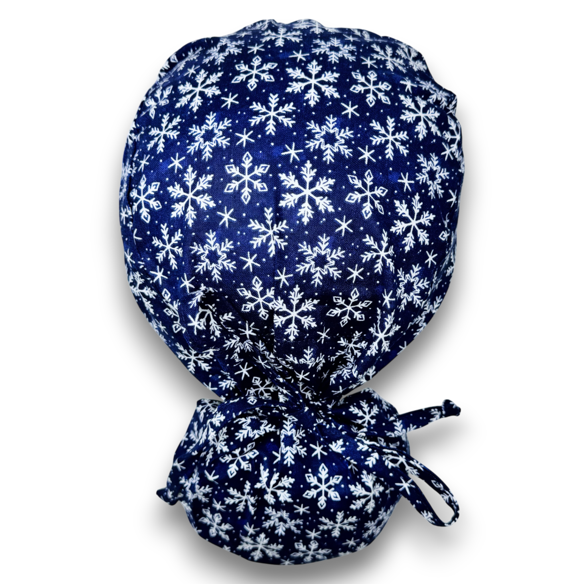 Snowflakes Ponytail scrub cap for women with satin lined option by Paradise Caps.