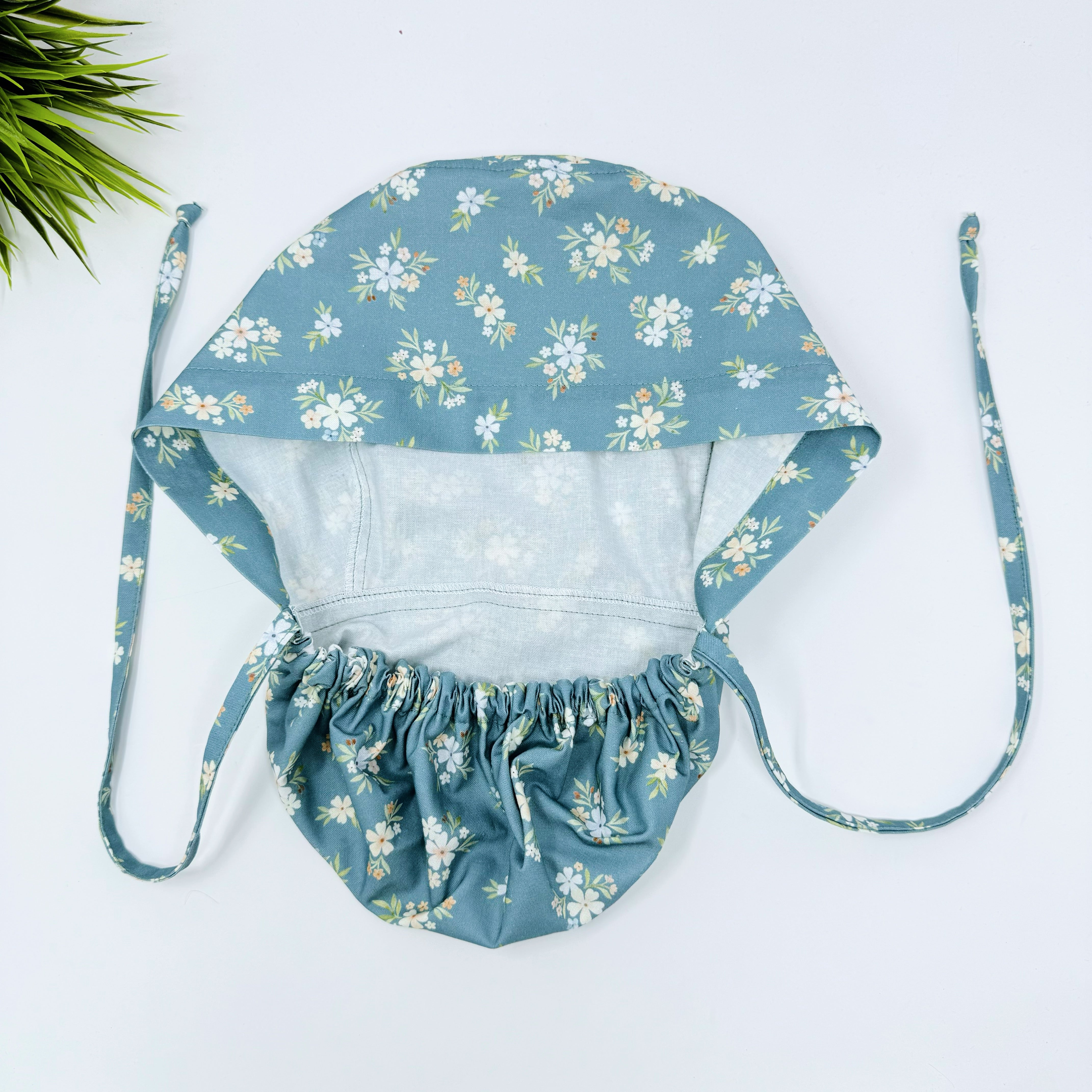 Sage Posies Ponytail scrub cap for women with satin lined option by Paradise Caps.