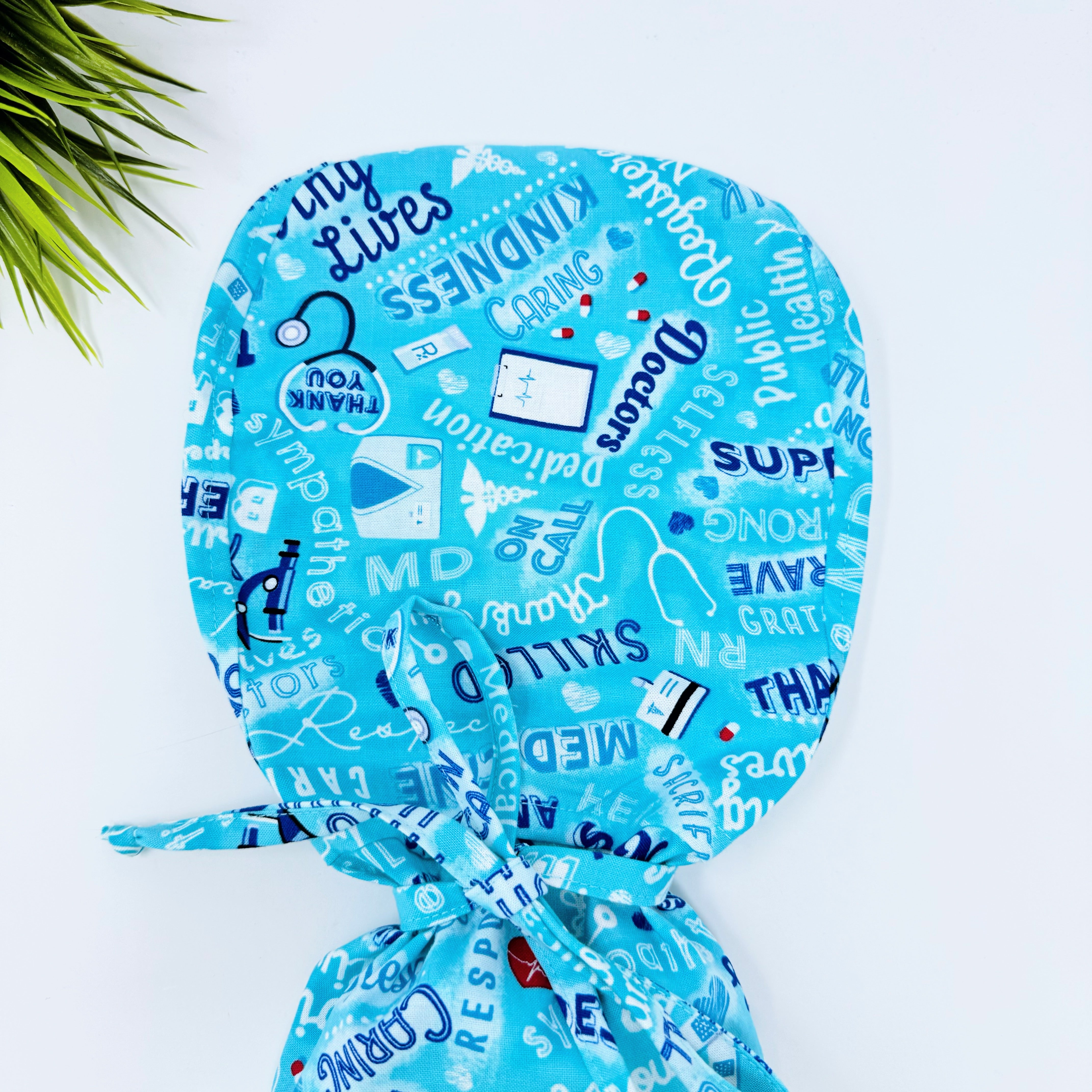 Medical Heroes Ponytail scrub cap for women with satin lined option by Paradise Caps.