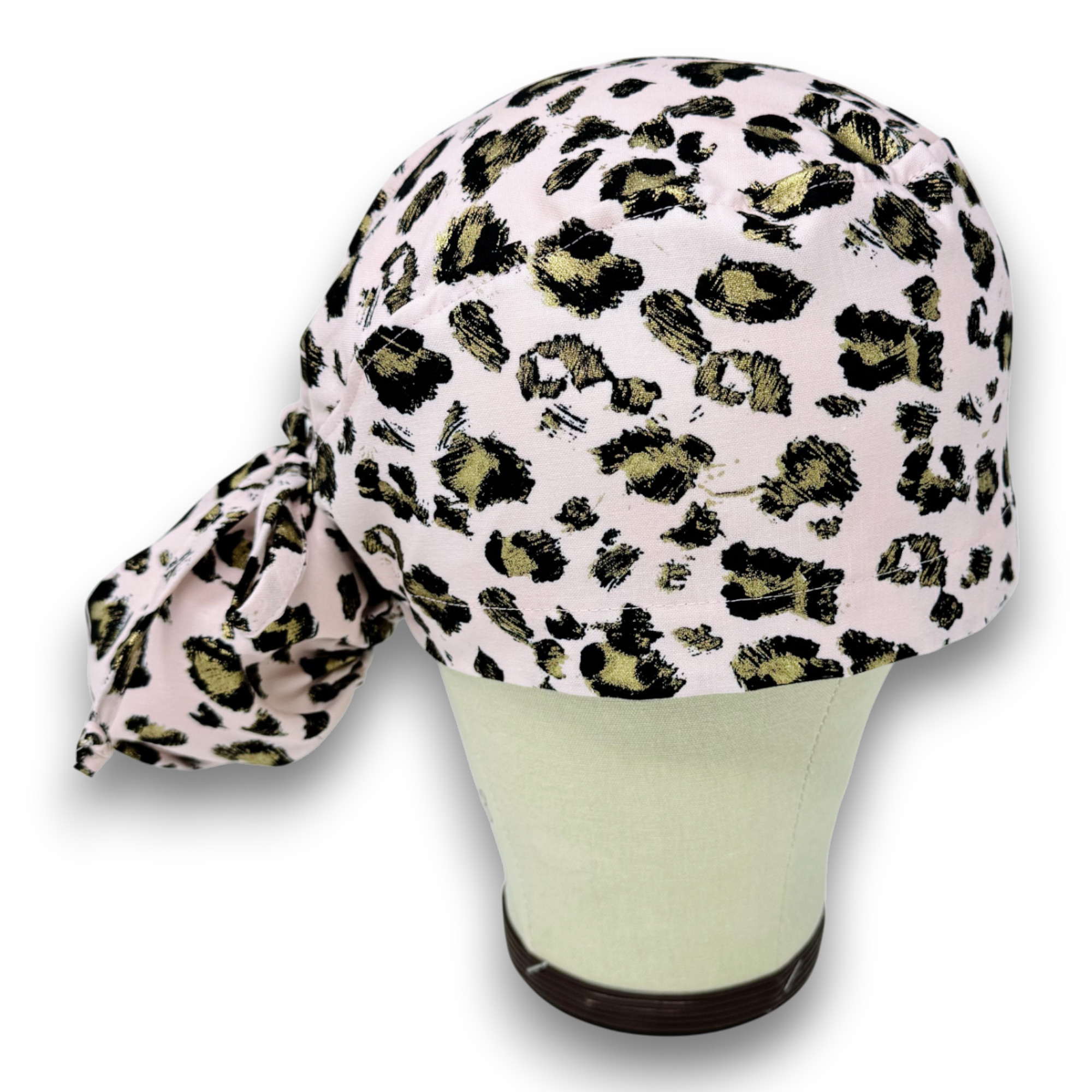 Pink leopard Ponytail scrub cap for women with satin lined option by Paradise Caps.