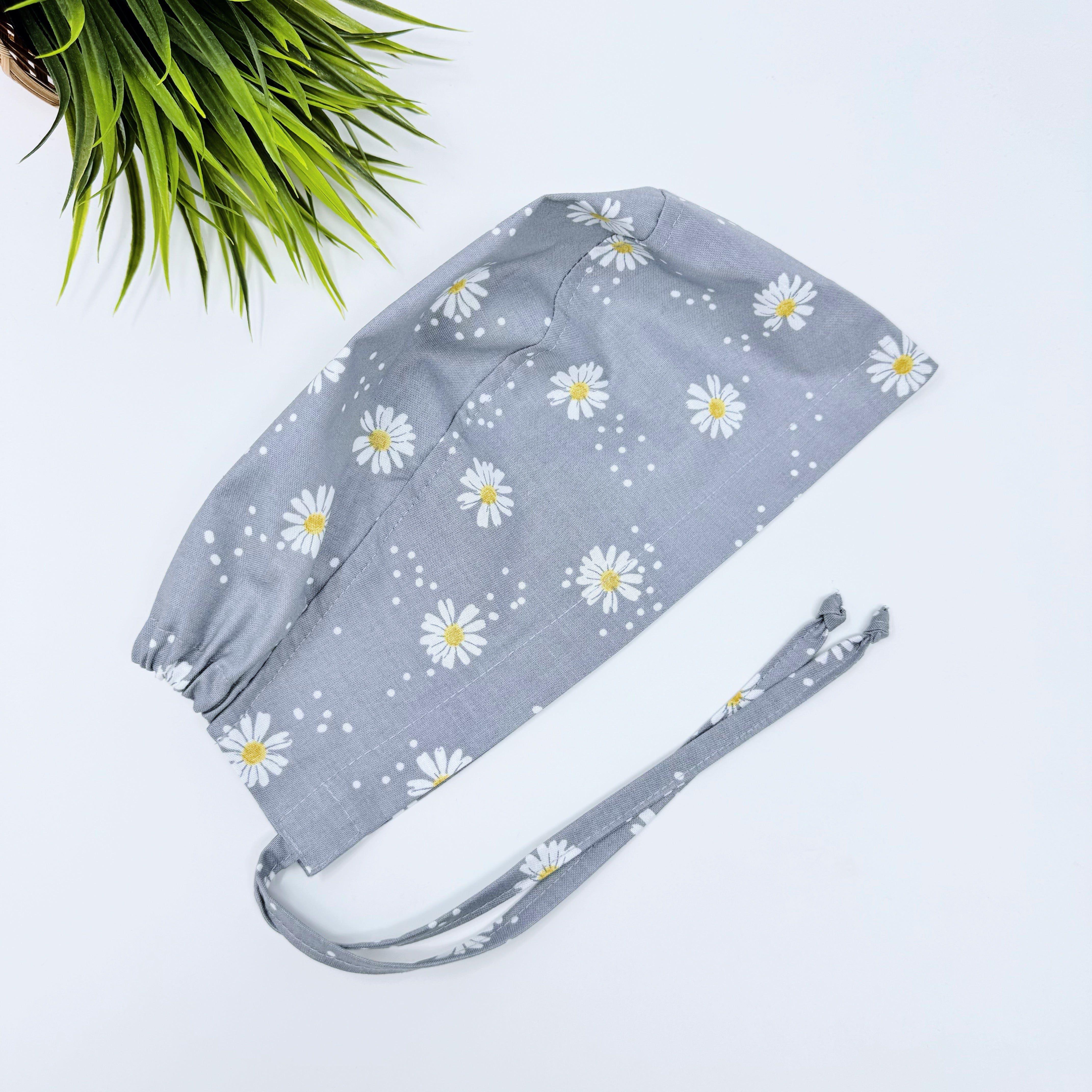 Gray Daisy Dots Skull tie-back style surgical scrub cap for men by Paradise Caps.