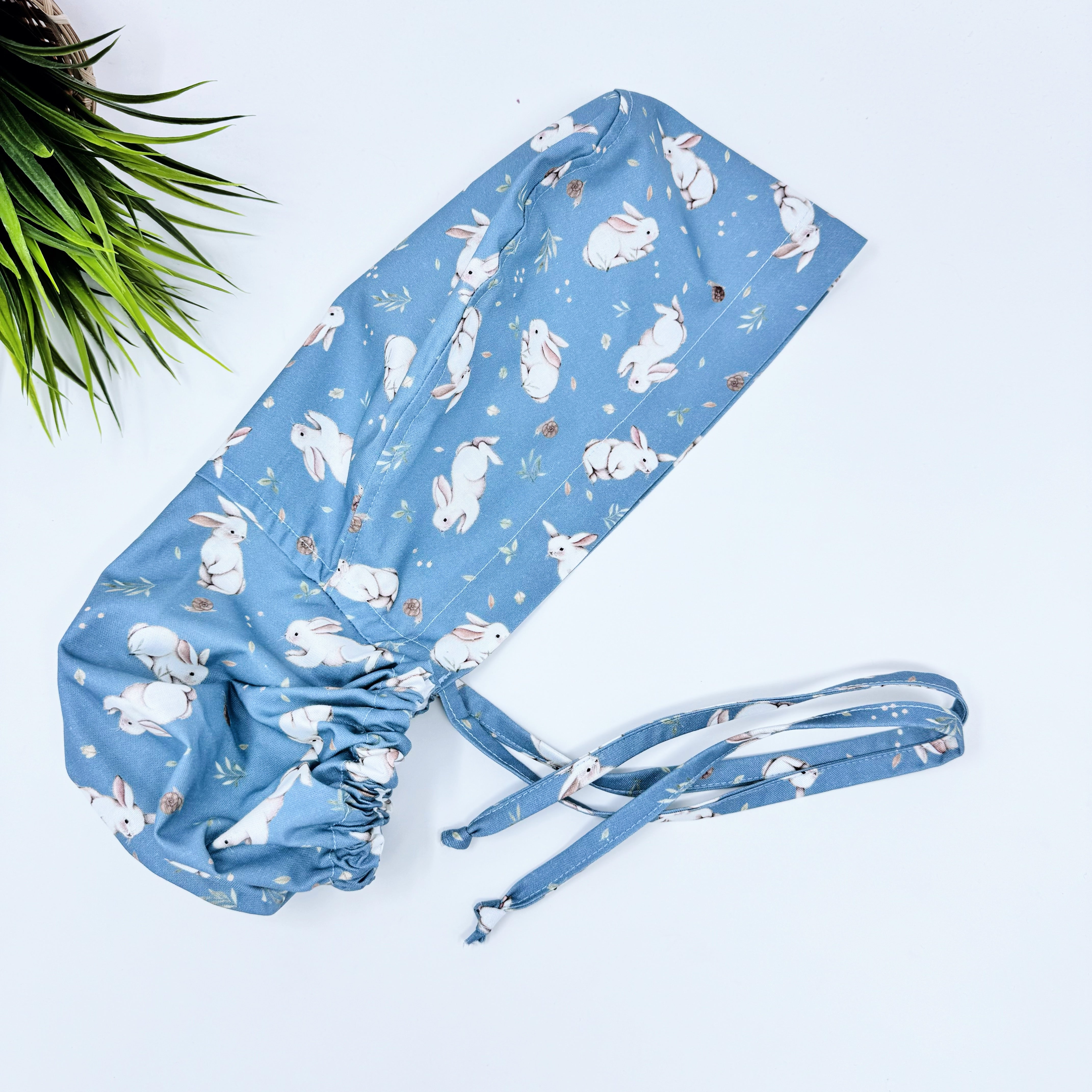 Sage Bunnies Ponytail scrub cap for women with satin lined option by Paradise Caps.