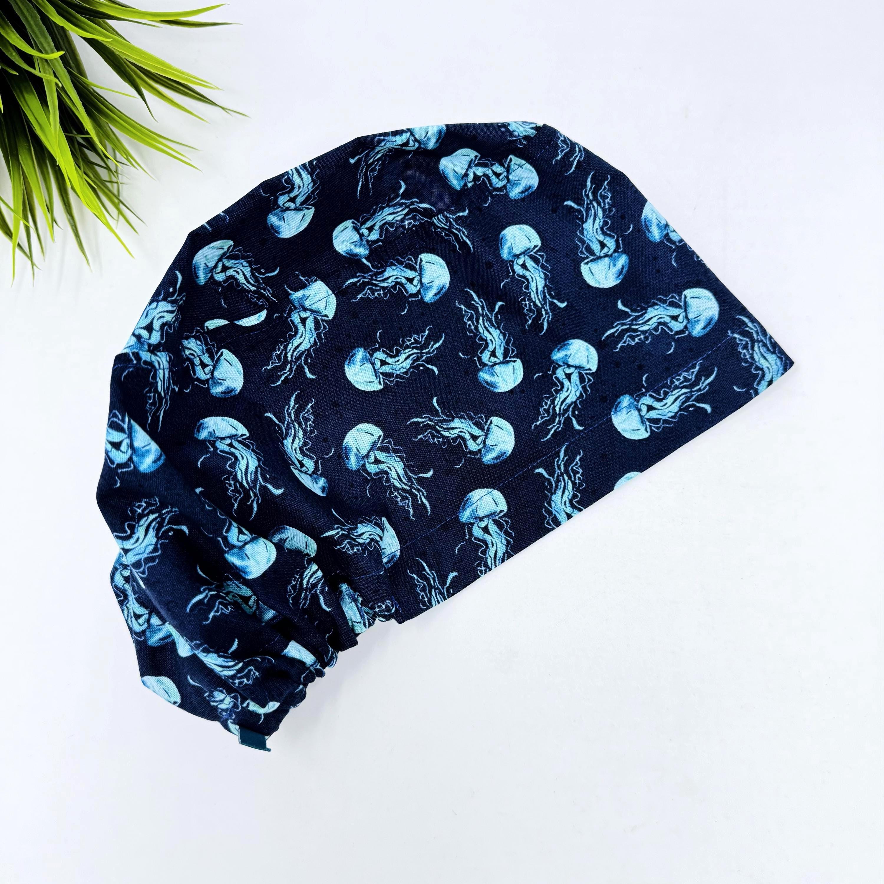 Jellyfish Euro scrub cap for women. Navy Blue Ocean Print surgical hap with satin lined option by Paradise Caps.