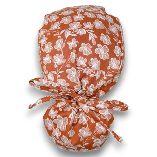 Floral Ponytail scrub cap for women with satin lined option by Paradise Caps.