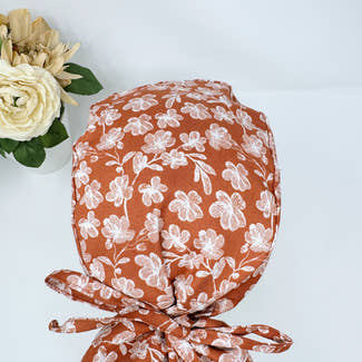 Floral Ponytail scrub cap for women with satin lined option by Paradise Caps.
