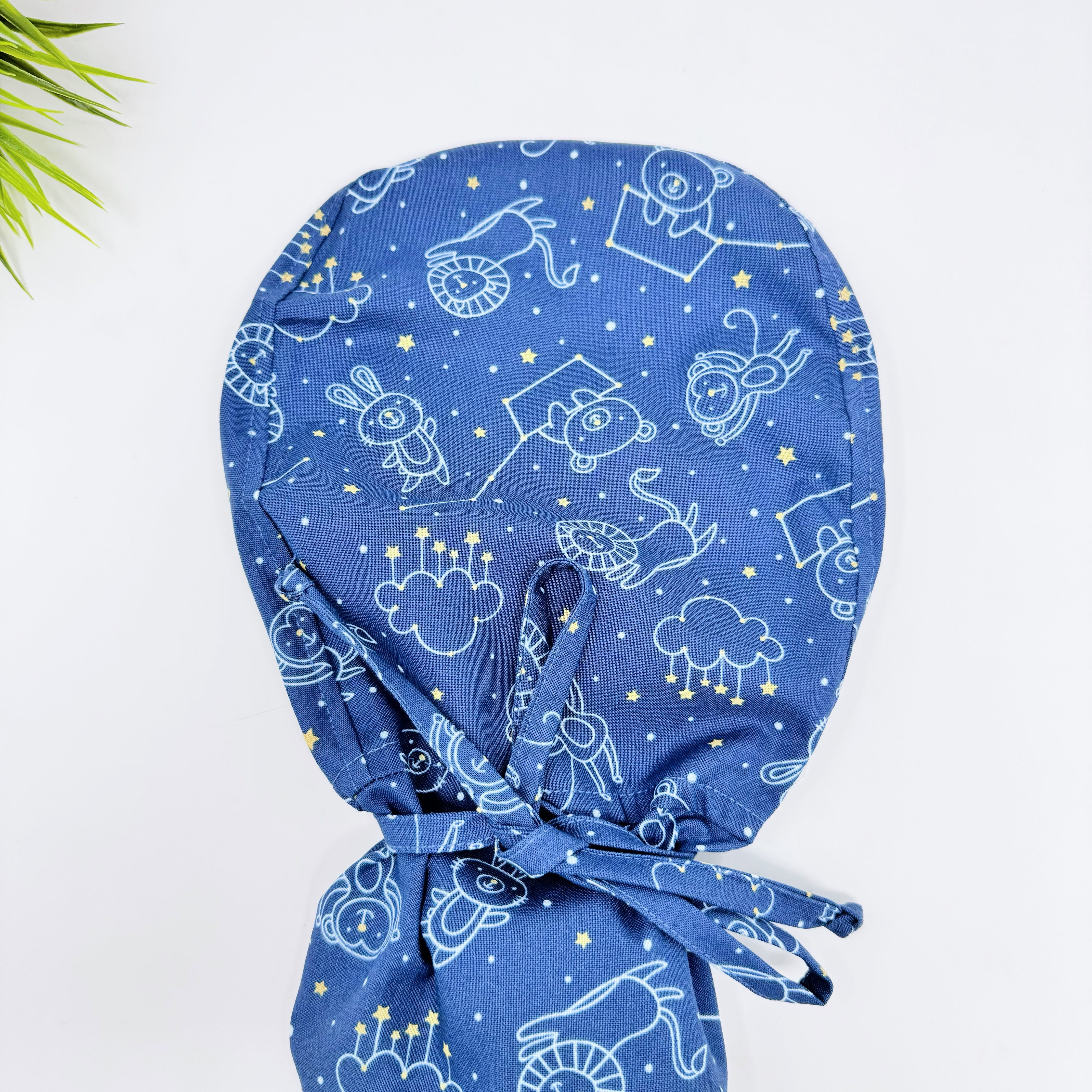 Navy Constellations Ponytail scrub cap for women with satin lined option by Paradise Caps.