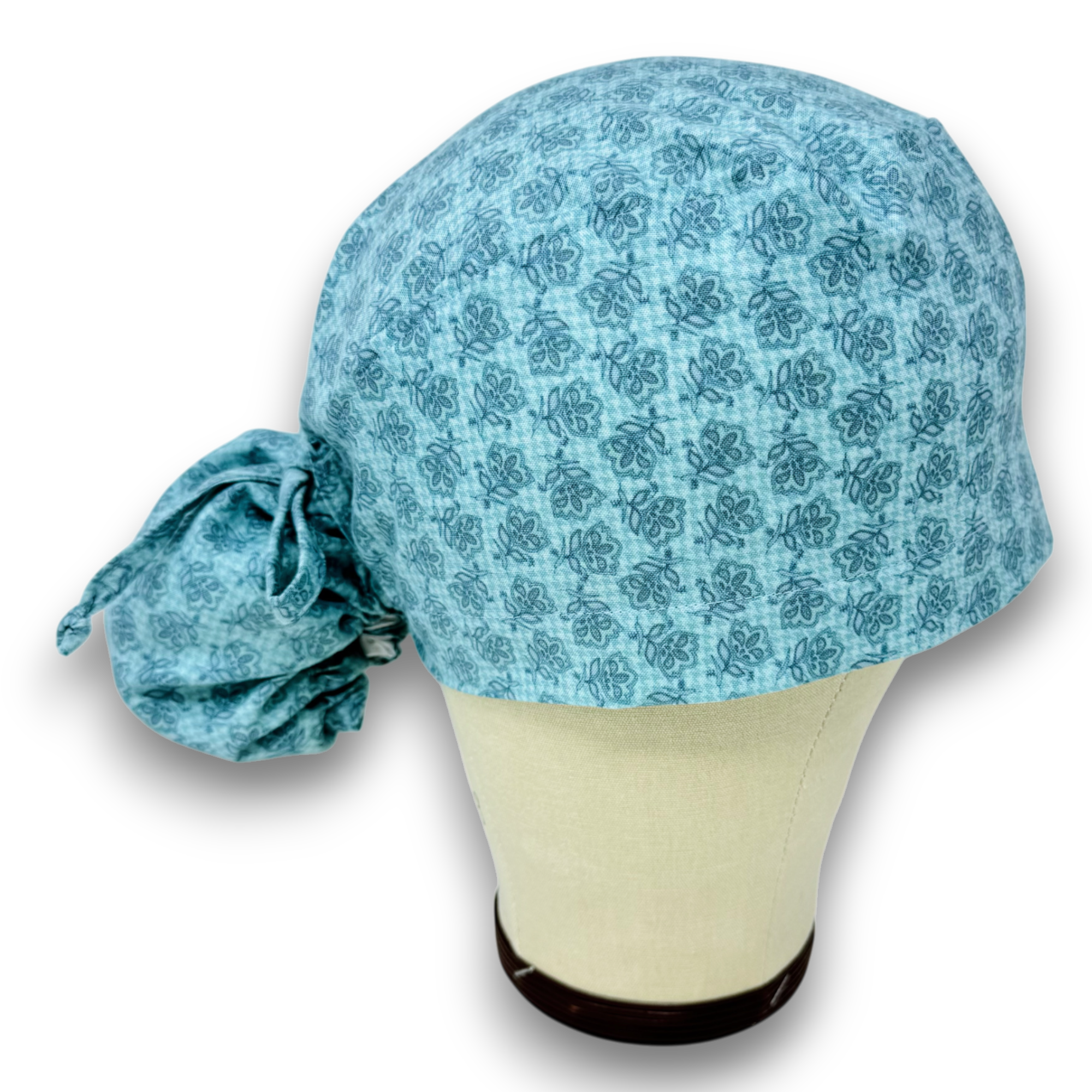 Floral Ponytail scrub cap for women with satin lined option by Paradise Caps.