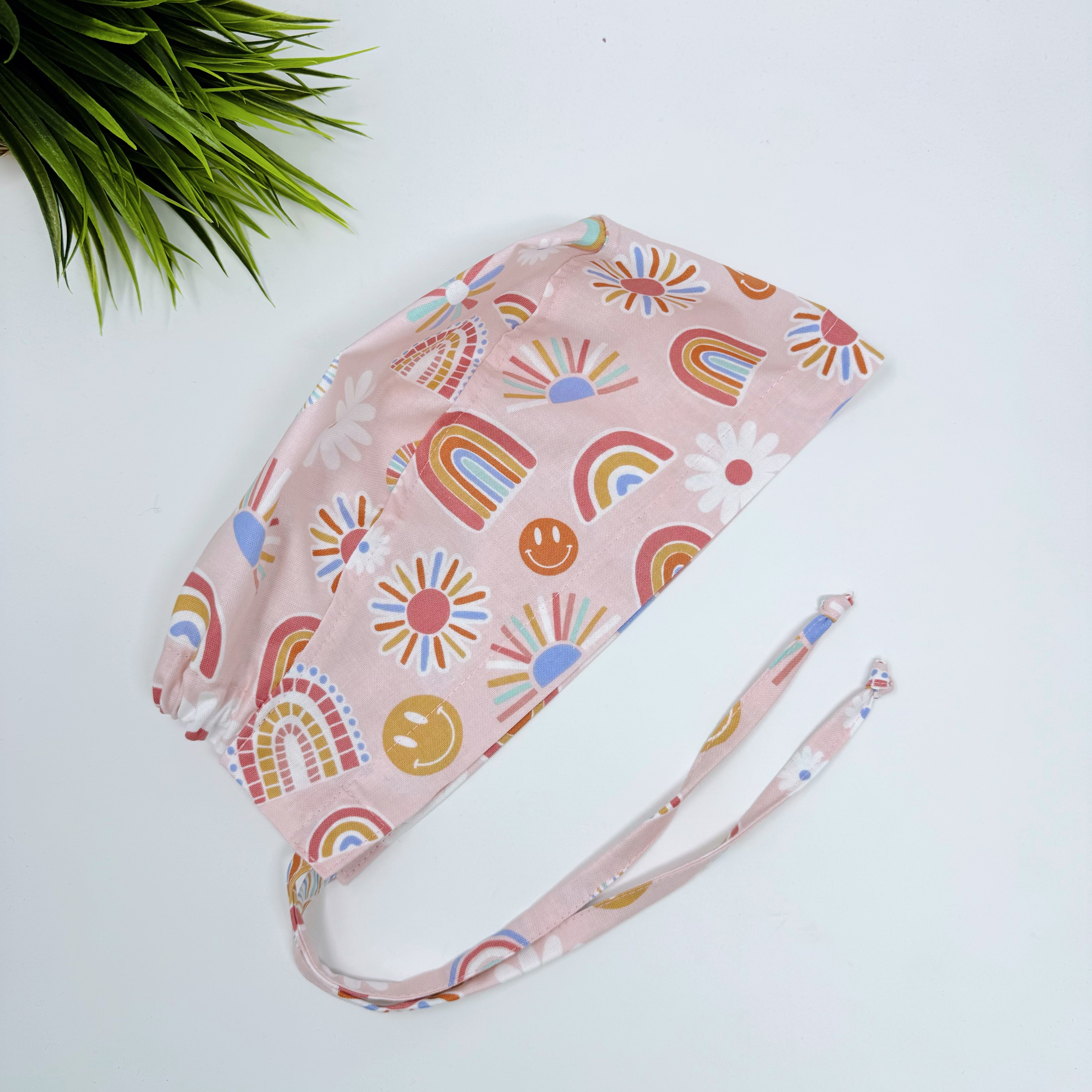 Rainbows Skull tie-back style surgical scrub cap for men by Paradise Caps.