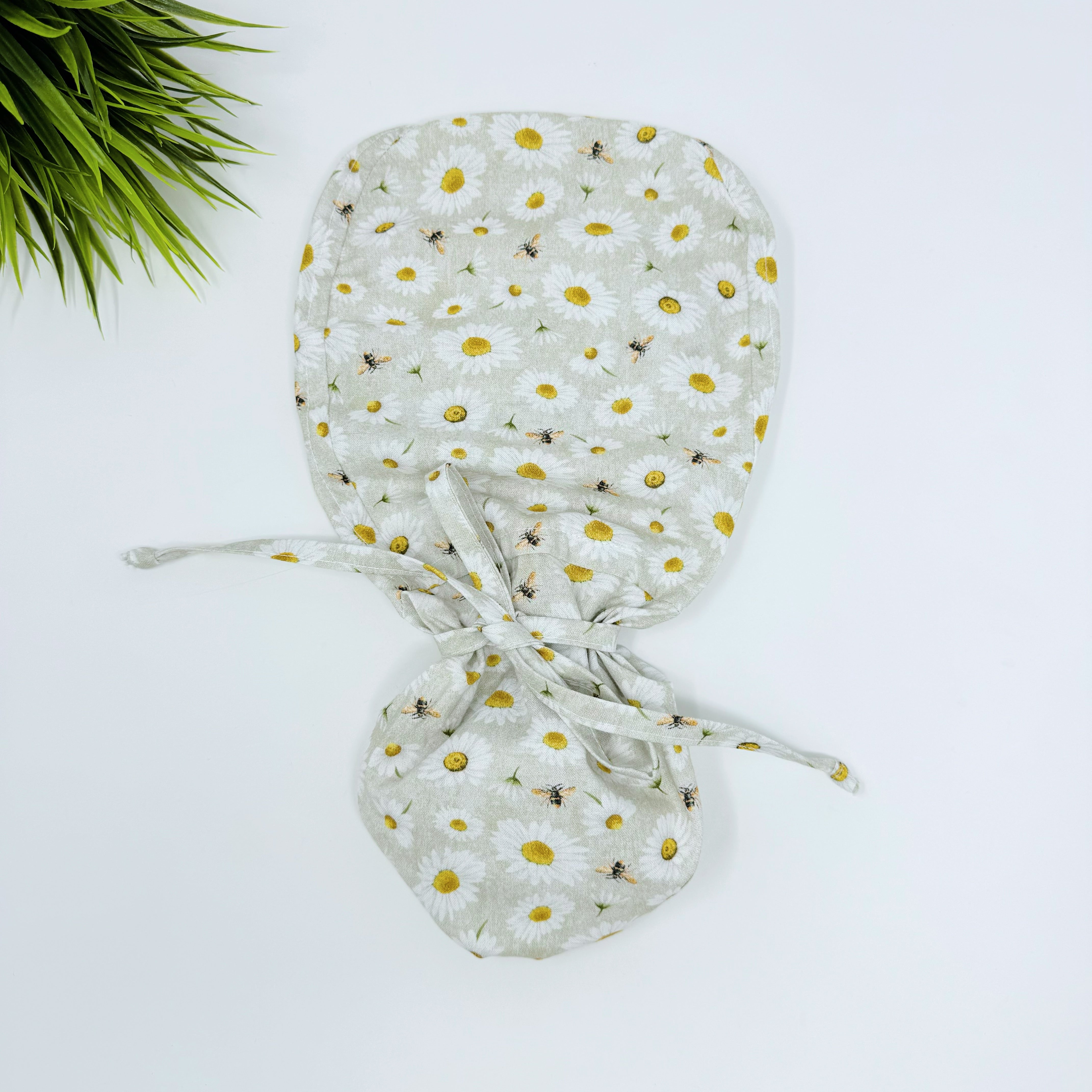 Bee And Daisy Ponytail scrub cap for women with satin lined option by Paradise Caps.