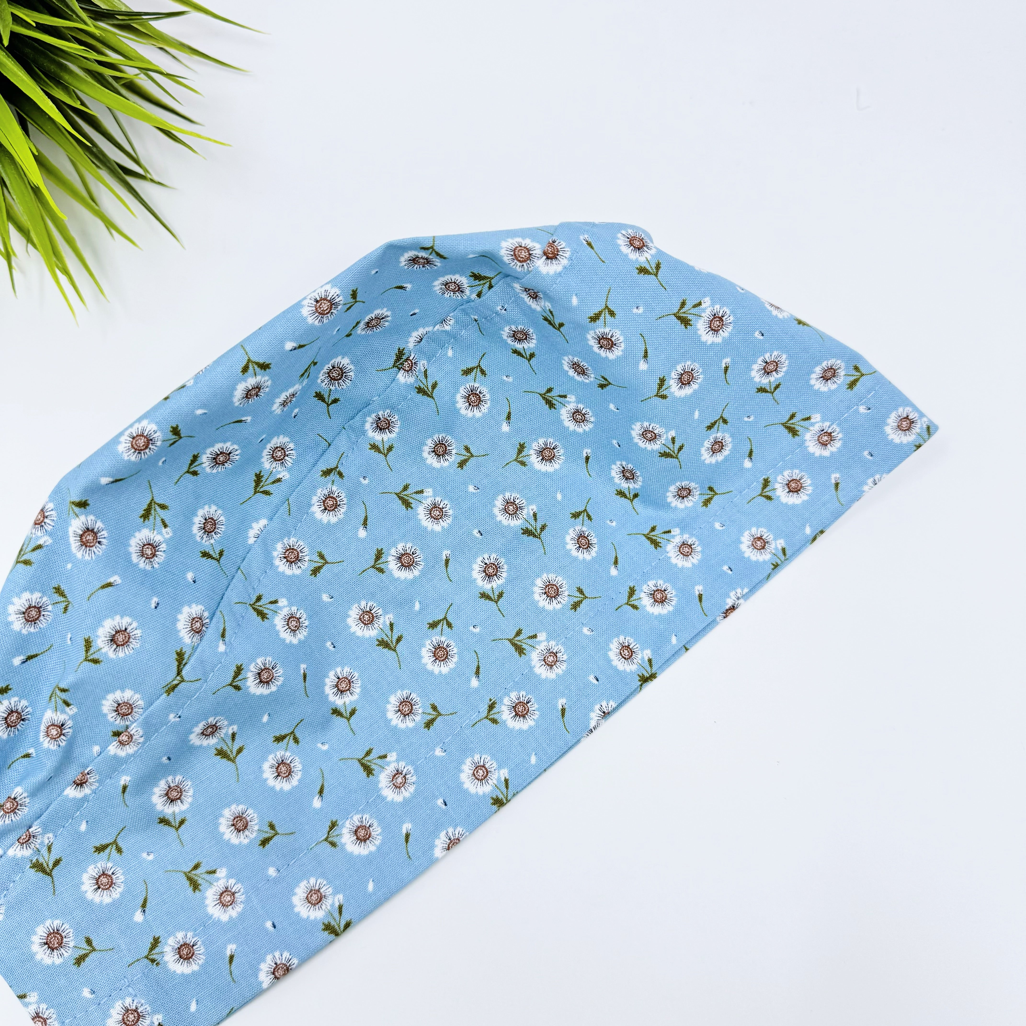 Tossed Daises Skull tie-back style surgical scrub cap for men by Paradise Caps.