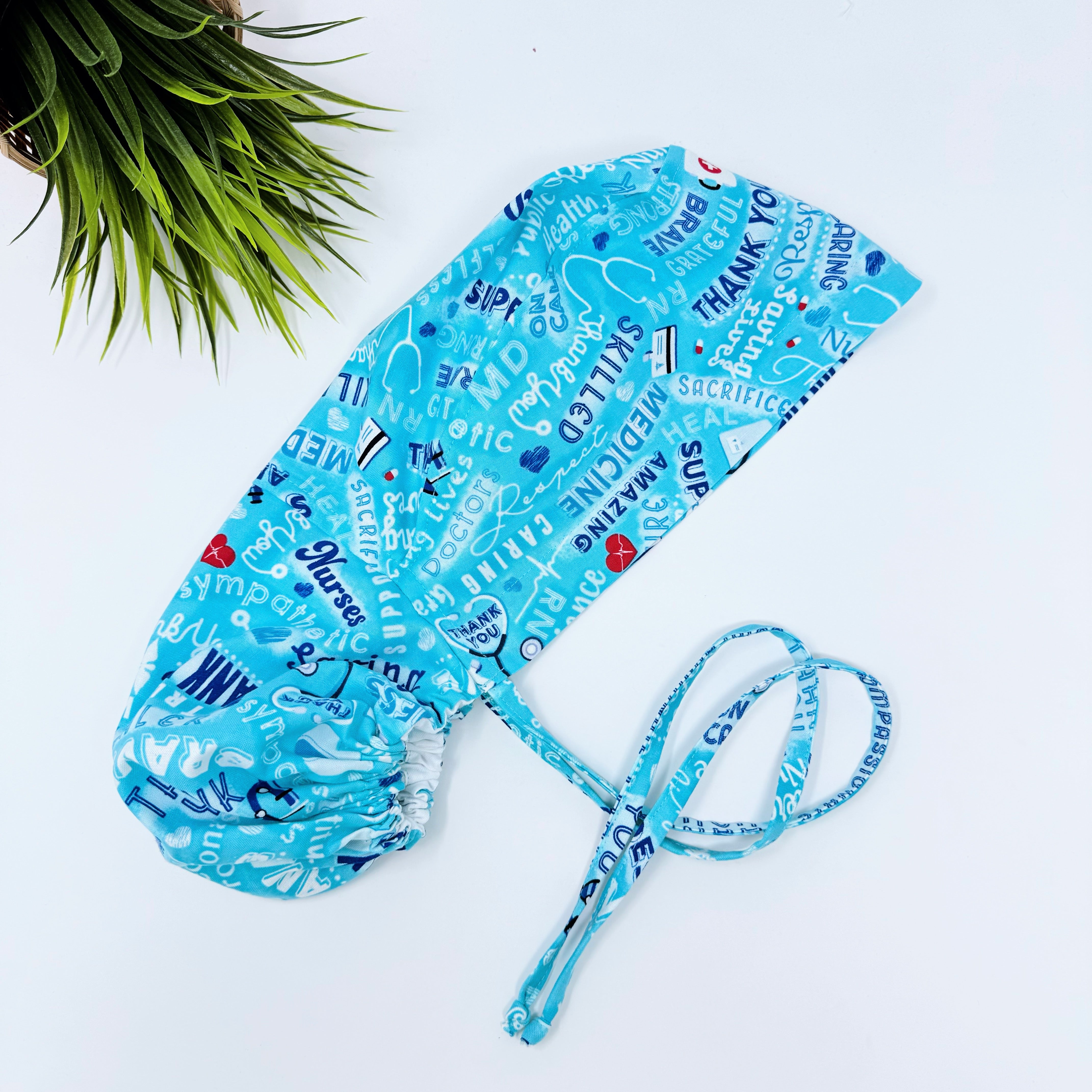 Medical Heroes Ponytail scrub cap for women with satin lined option by Paradise Caps.