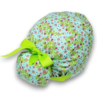 Pink flower Ponytail scrub cap for women with satin lined option by Paradise Caps.