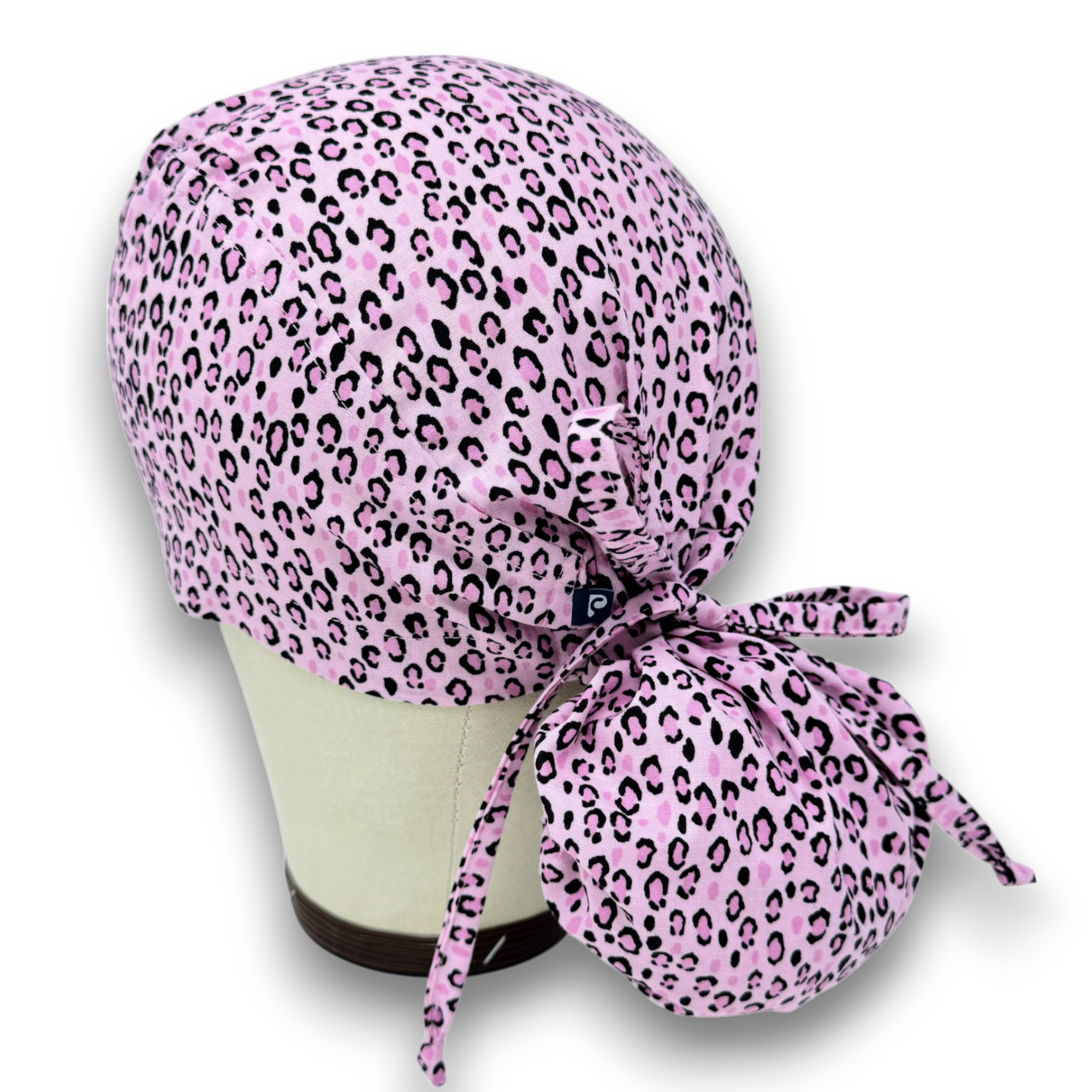 Leopard Ponytail scrub cap for women with satin lined option by Paradise Caps.