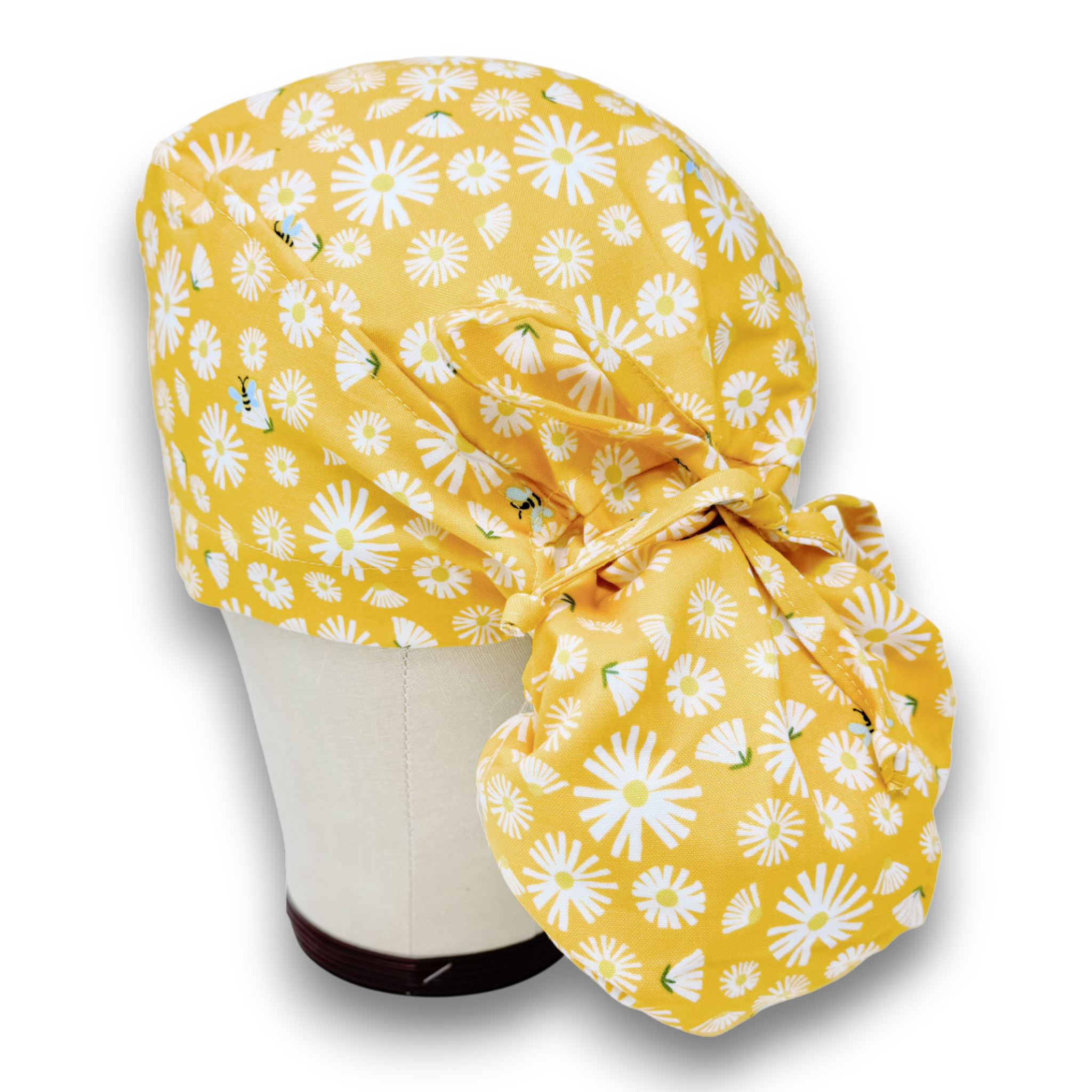 Yellow flowers Ponytail scrub cap for women with satin lined option by Paradise Caps.