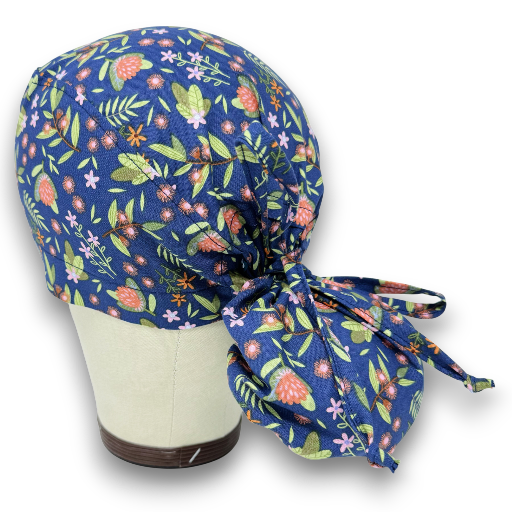 Floral Ponytail scrub cap for women with satin lined option by Paradise Caps.