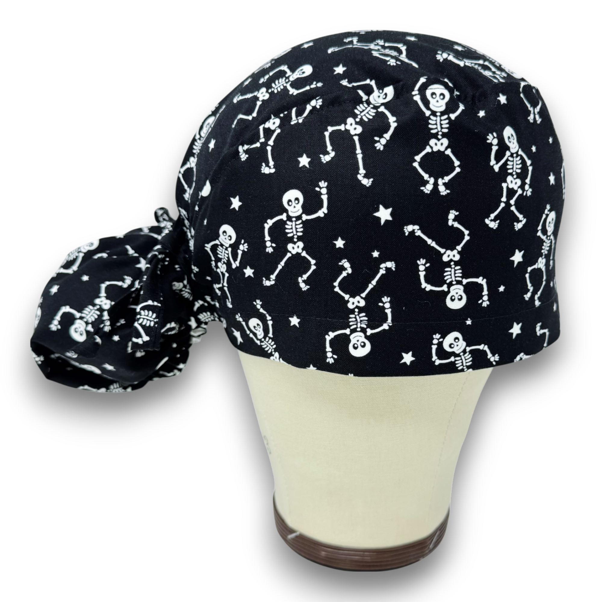 Dancing Skeletons Ponytail scrub cap for women with satin lined option by Paradise Caps.