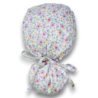 Floral Ponytail scrub cap for women with satin lined option by Paradise Caps.