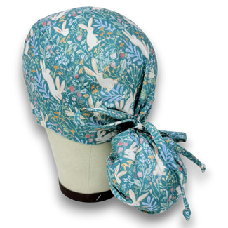 Ponytail scrub cap for women. Bunny Garden Satin Lined Option Surgical hat with ponytail by Paradise Caps. Easter.
