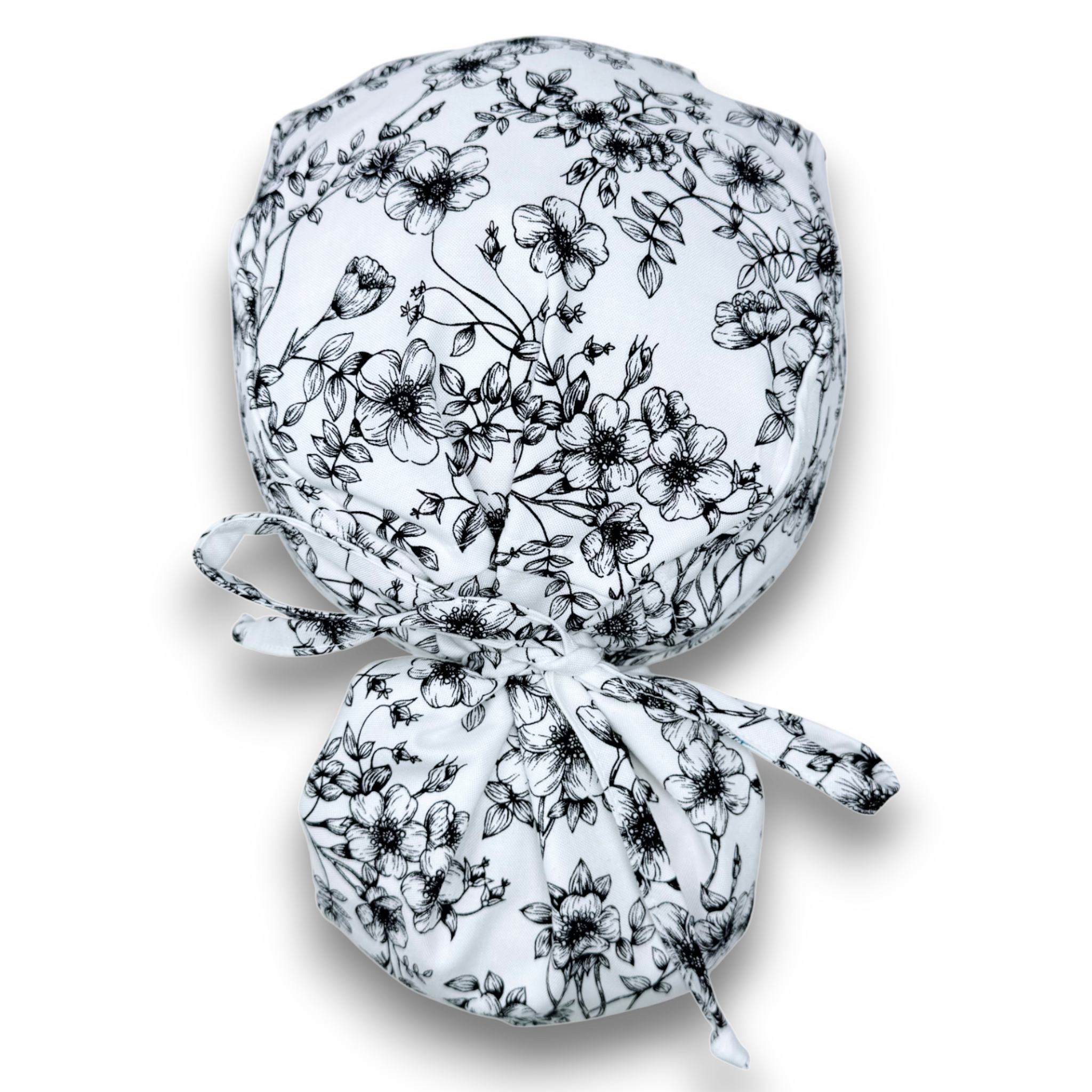 Floral Ponytail scrub cap for women with satin lined option by Paradise Caps.