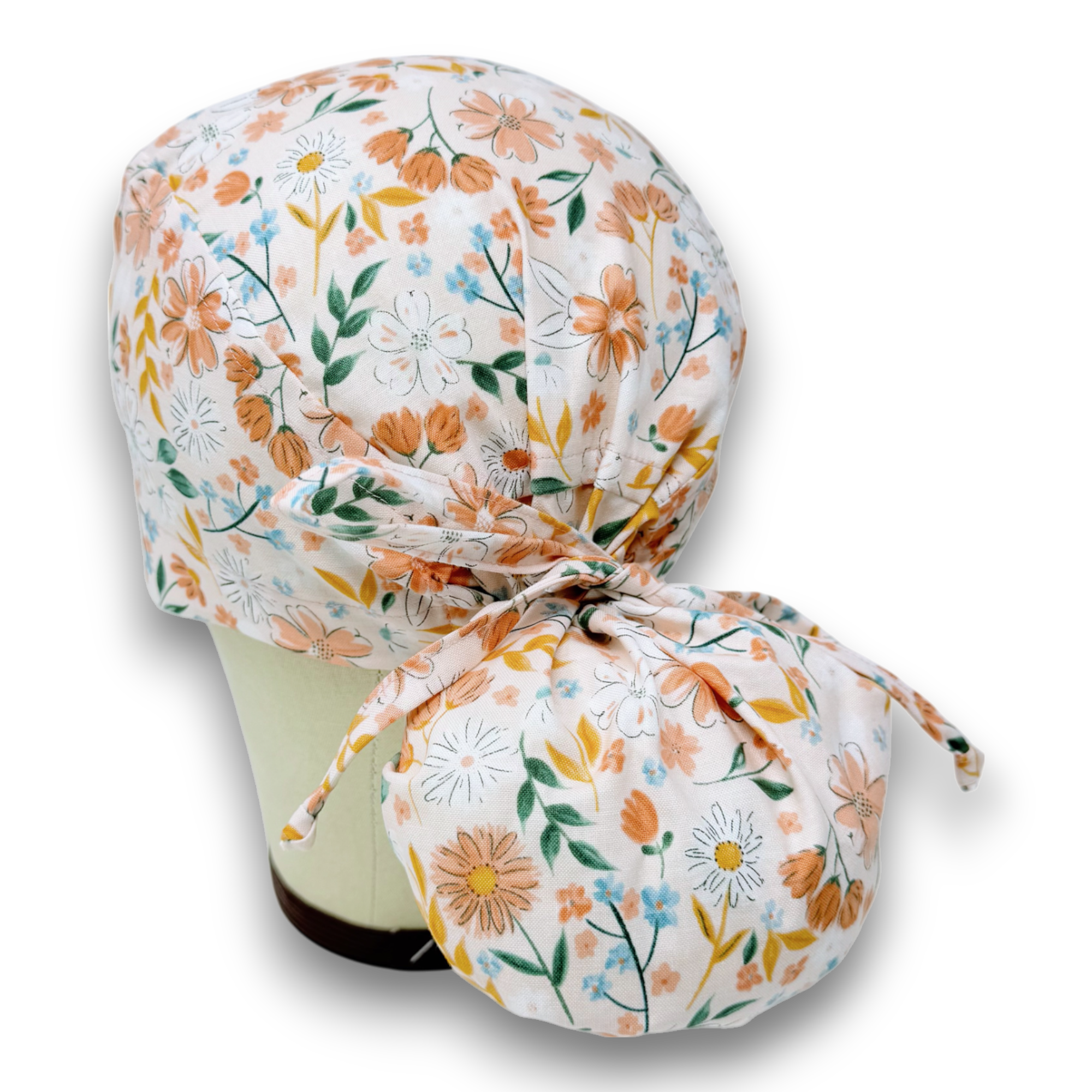 Floral Ponytail scrub cap for women with satin lined option by Paradise Caps.