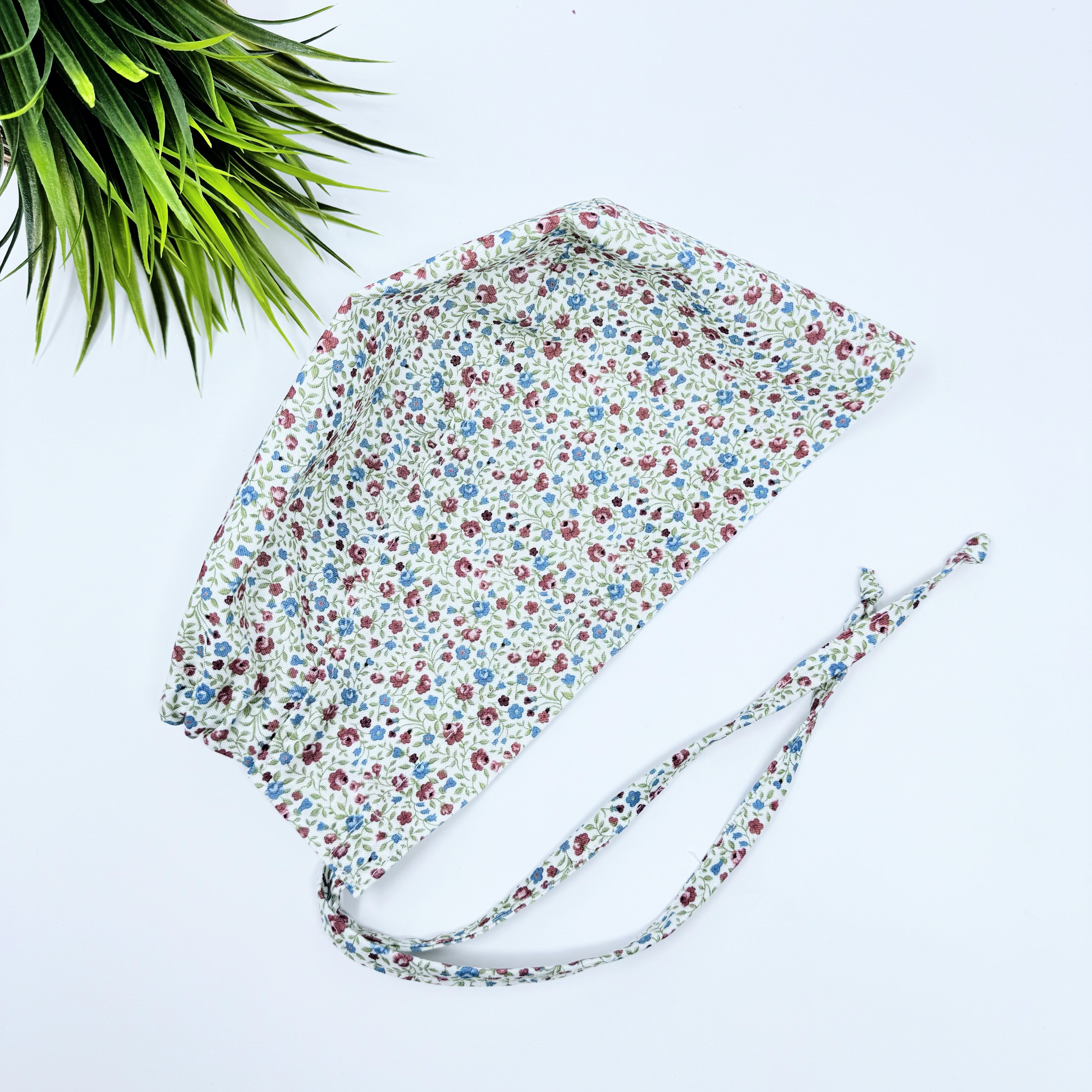 Red Blue Skull tie-back style surgical scrub cap for men by Paradise Caps.