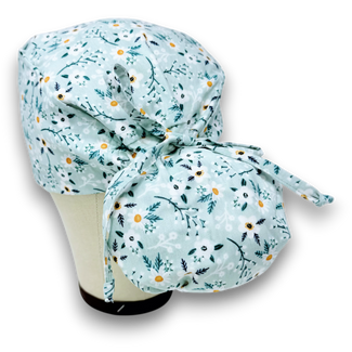 Floral Ponytail scrub cap for women with satin lined option by Paradise Caps.