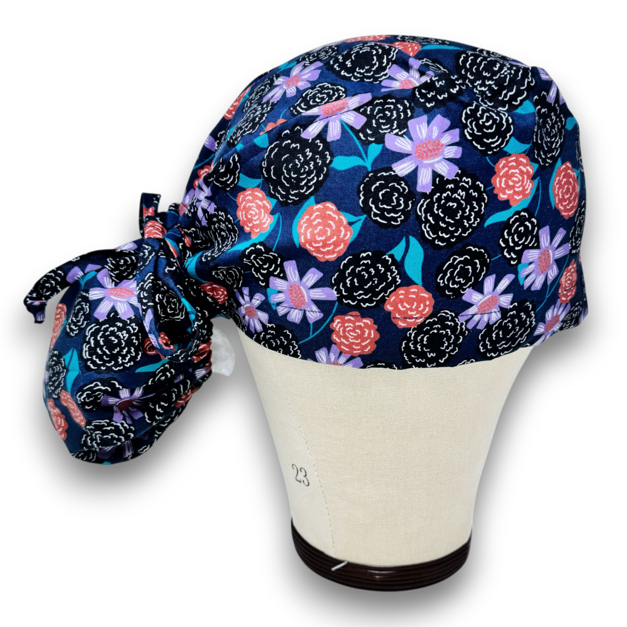 Flower Ponytail scrub cap for women with satin lined option by Paradise Caps.