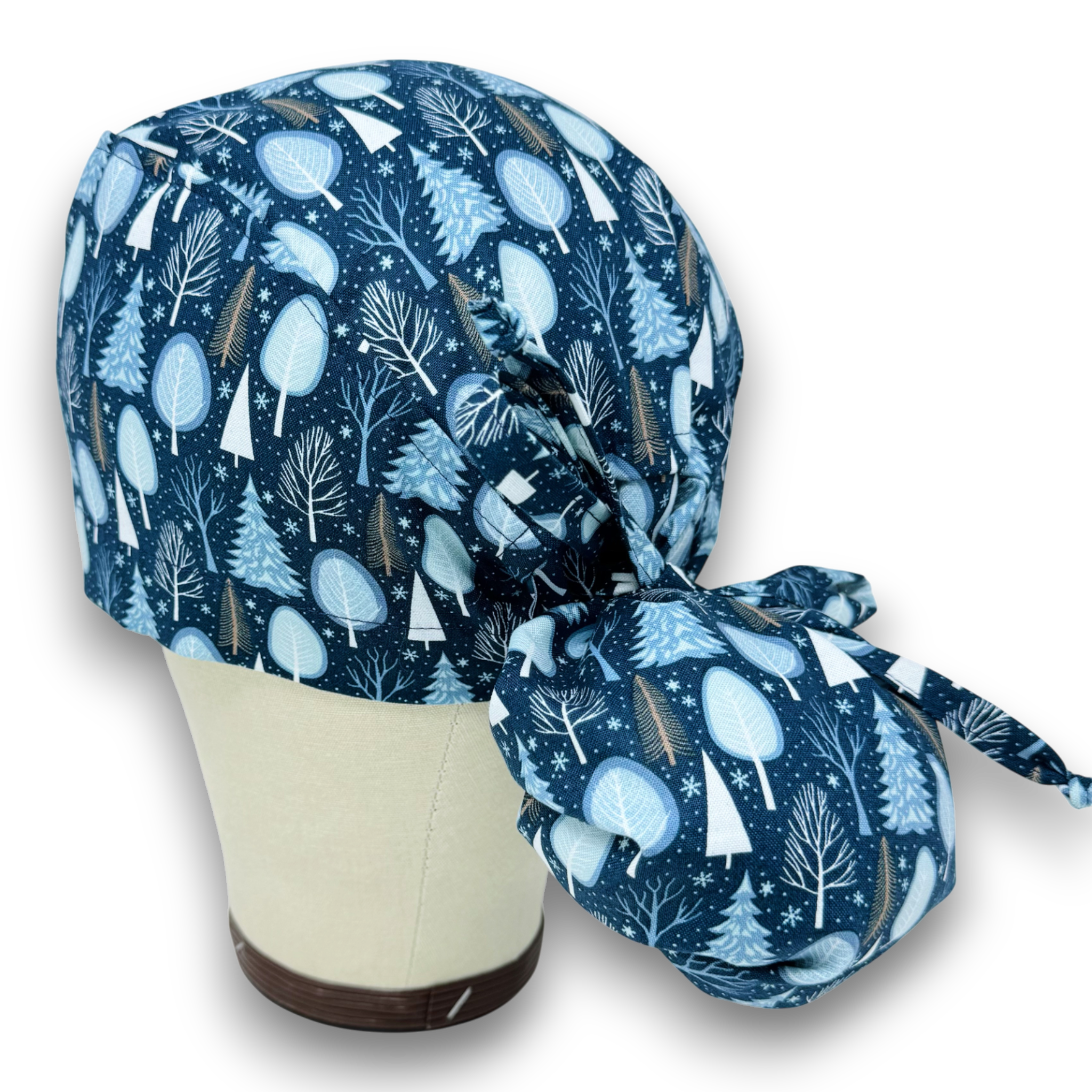 Christmas tree Ponytail scrub cap with satin lined option. Winter trees scrub hat for women by Paradise Caps. Blue.