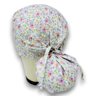 Floral Ponytail scrub cap for women with satin lined option by Paradise Caps.