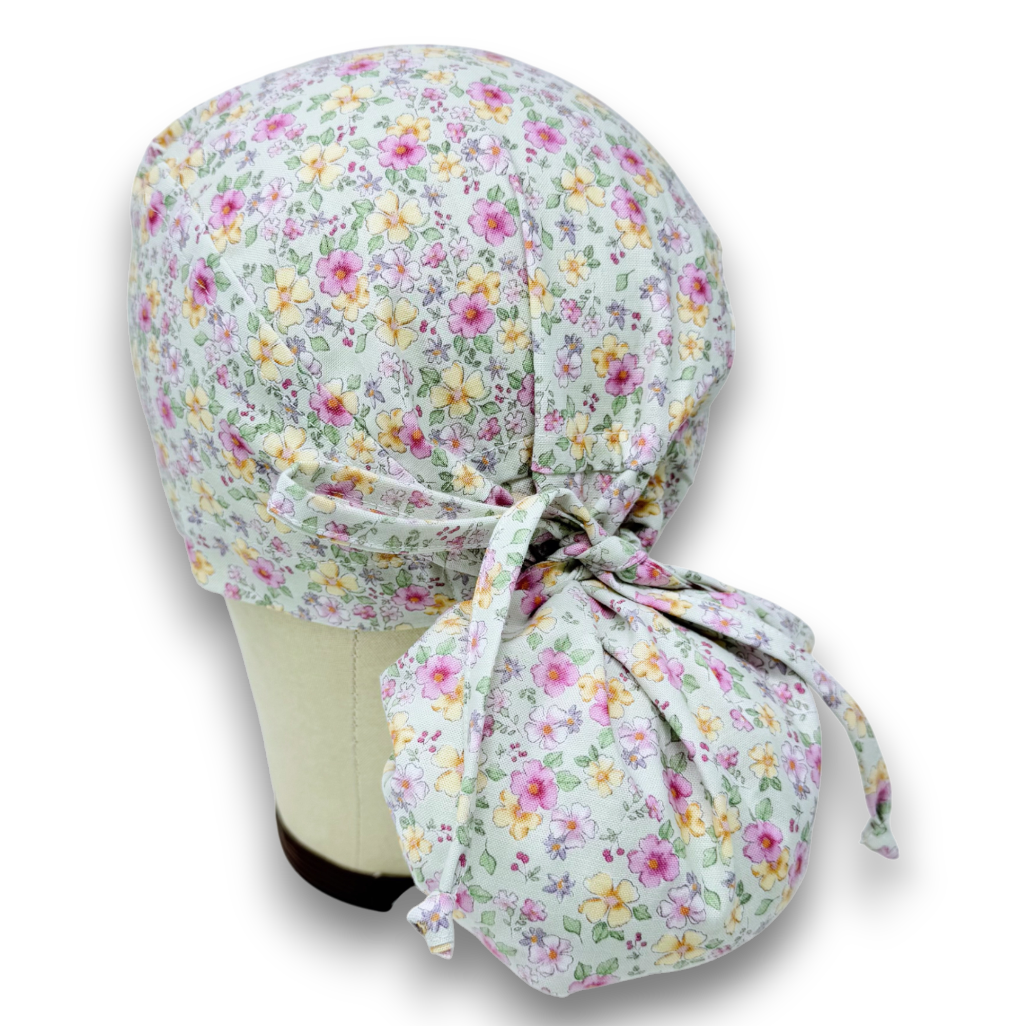 Floral Ponytail scrub cap for women with satin lined option by Paradise Caps.