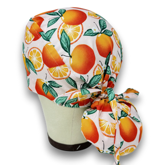 Orange Ponytail scrub cap for women with satin lined option by Paradise Caps.