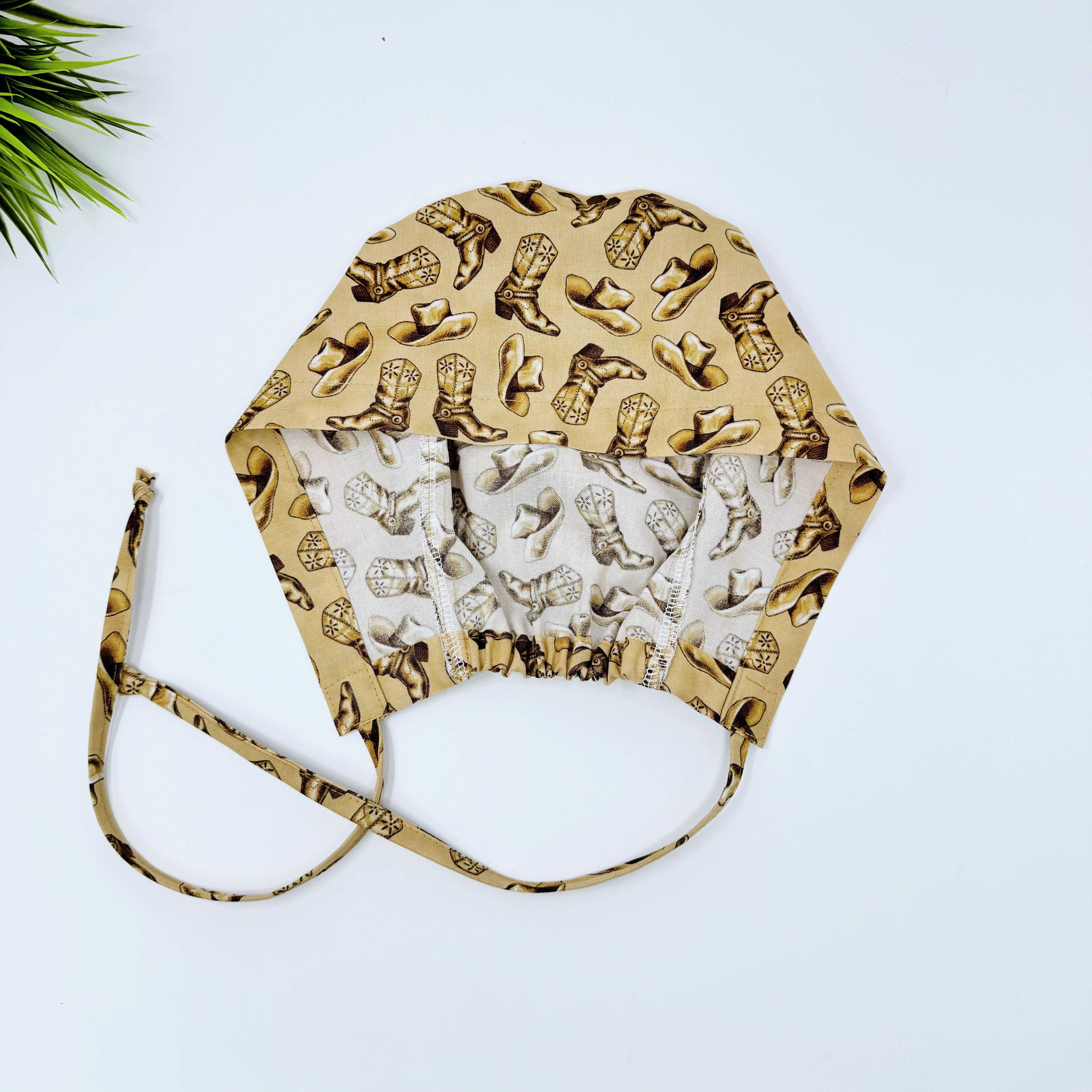 Cowboys Skull tie-back style surgical scrub cap for men by Paradise Caps.