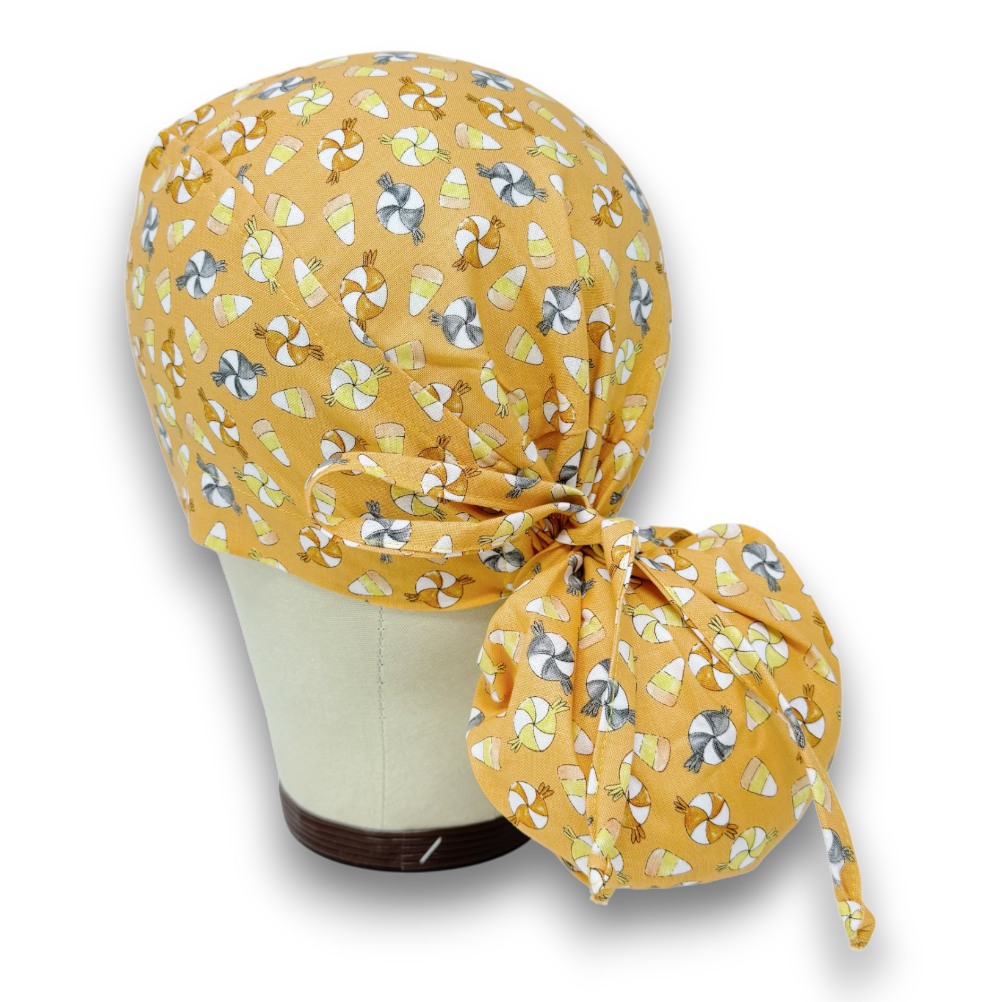 Candy Corn Ponytail scrub cap for women with satin lined option by Paradise Caps.