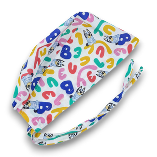 Funny Skull tie-back style surgical scrub cap for men by Paradise Caps.