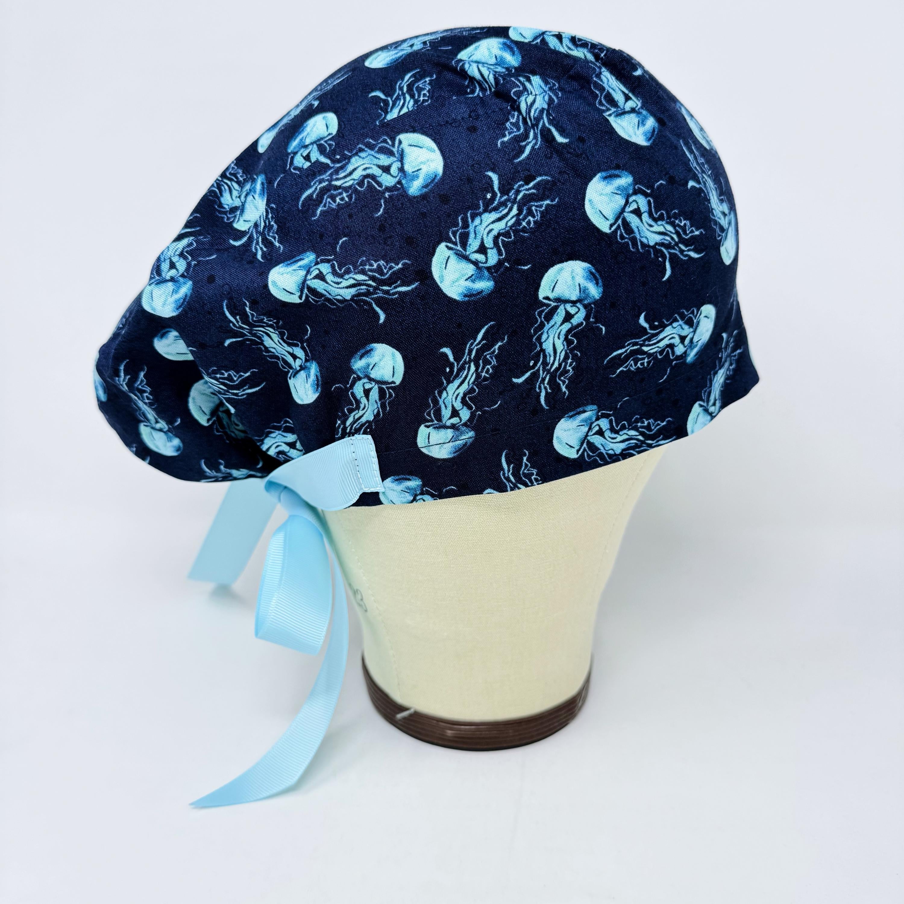 Jellyfish Euro scrub cap with ties for women. Navy Blue Ocean Print European satin lined surgical cap by Paradise Caps. Euro PLUS style.