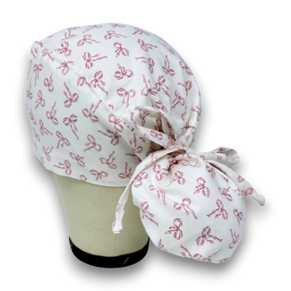 Pink Bows Ponytail scrub cap with satin lined. Bow Print surgical cap for women by Paradise Caps.